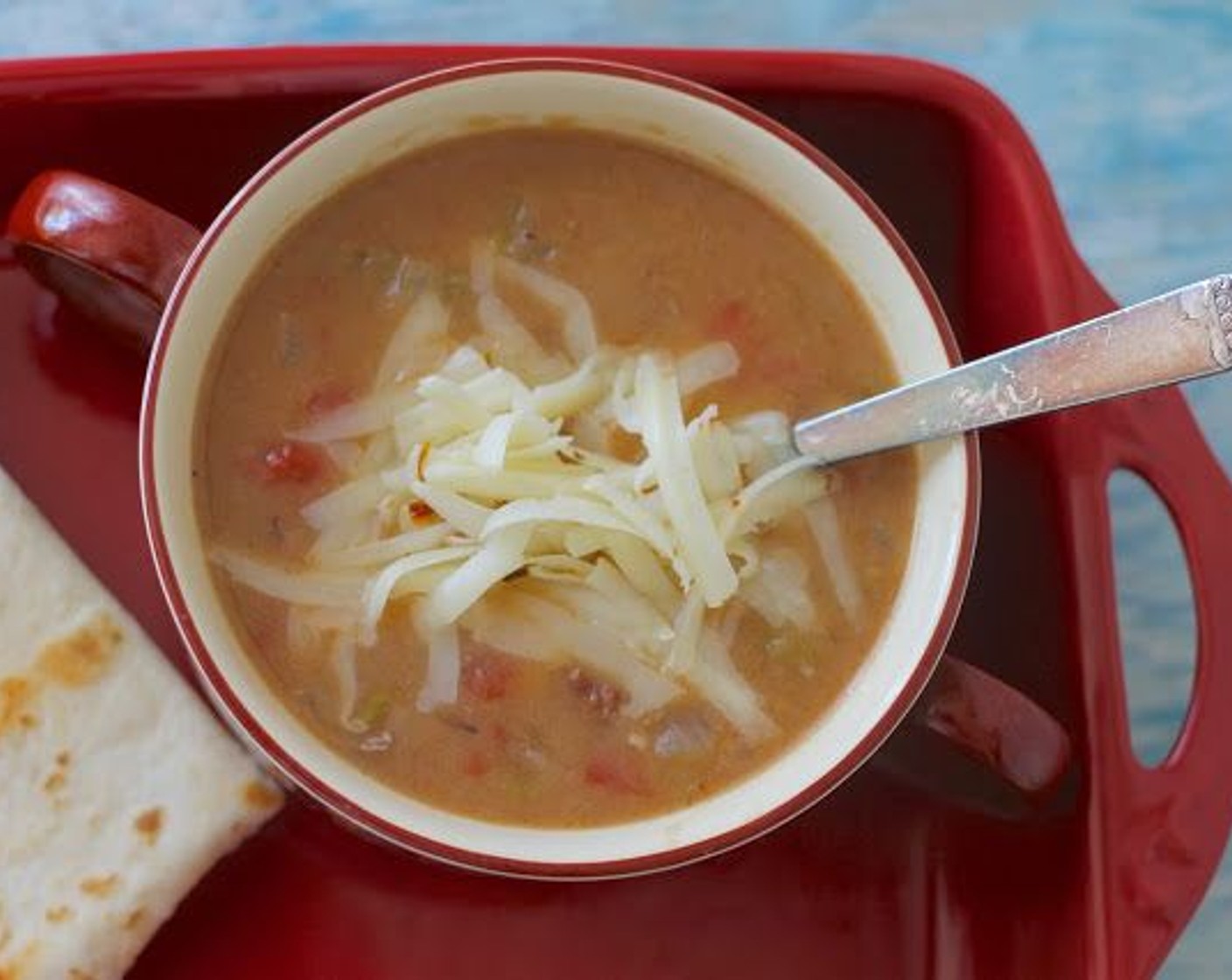 step 6 Serve in bowls topped with cheese and warmed tortillas on the side; or over burritos, enchiladas, tortilla chips, rice or beans.