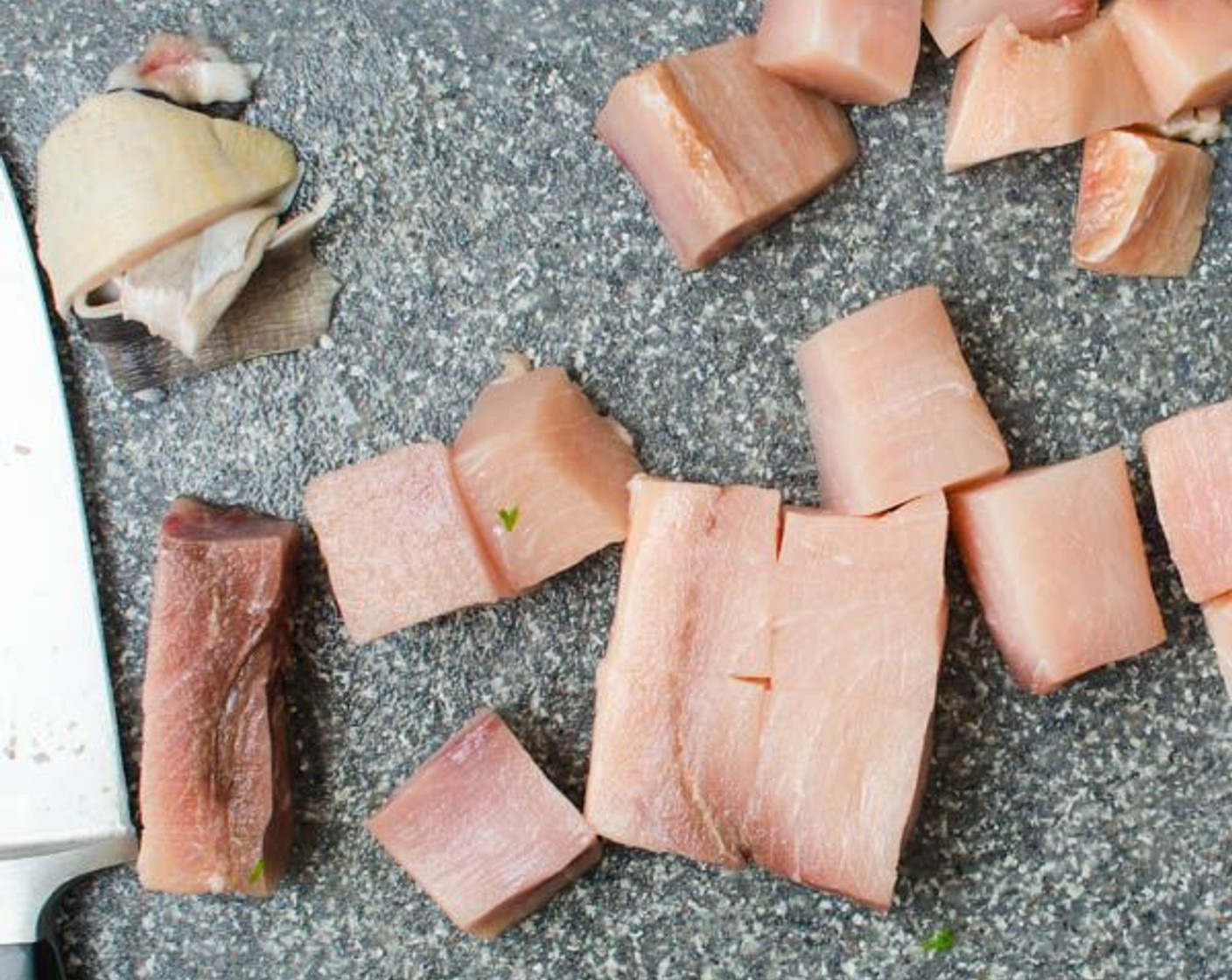 step 3 With a sharp knife, trim skin from the Swordfish Fillet (1.5 lb). Cut swordfish into large cubes about 1 1/2" inches thick and place them in a bowl.