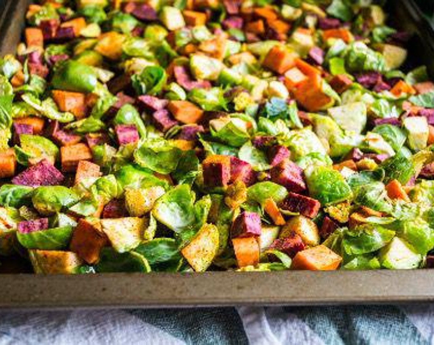 step 3 Spread vegetables out on large baking sheet into single layer, bake 10 minutes, then remove and stir.