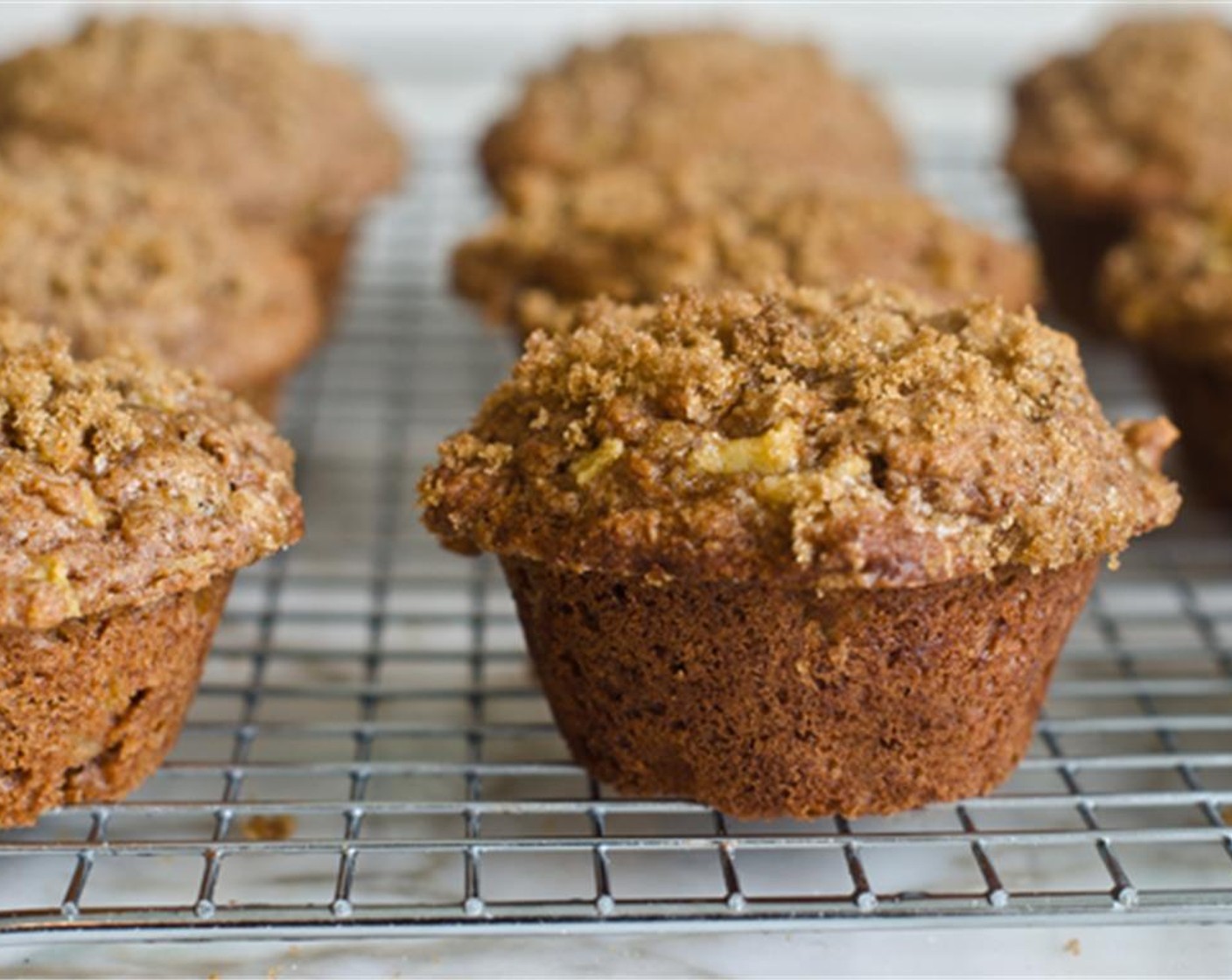 step 9 Remove the muffins from the oven, cool them for 5 minutes in the pan, then turn them out onto a rack to finish cooling completely. Serve and enjoy!