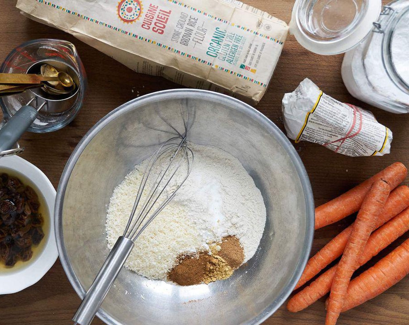 step 4 In a large bowl, combine Brown Rice Flour (1 cup), Unsweetened Shredded Coconut (1/2 cup), Baking Powder (1 tsp), Ground Cinnamon (1 tsp), Baking Soda (1/2 tsp), Ground Ginger (1/2 tsp), and Ground Nutmeg (1/2 tsp).