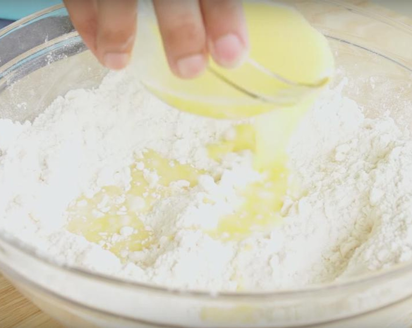 step 2 Beat together Egg (1), Water (1/3 cup), and Distilled White Vinegar (1 Tbsp) in a small bowl with a fork. Add to flour mixture, use your hand and mix in the bowl until it forms a dough. Knead it a little until the dough comes together.
