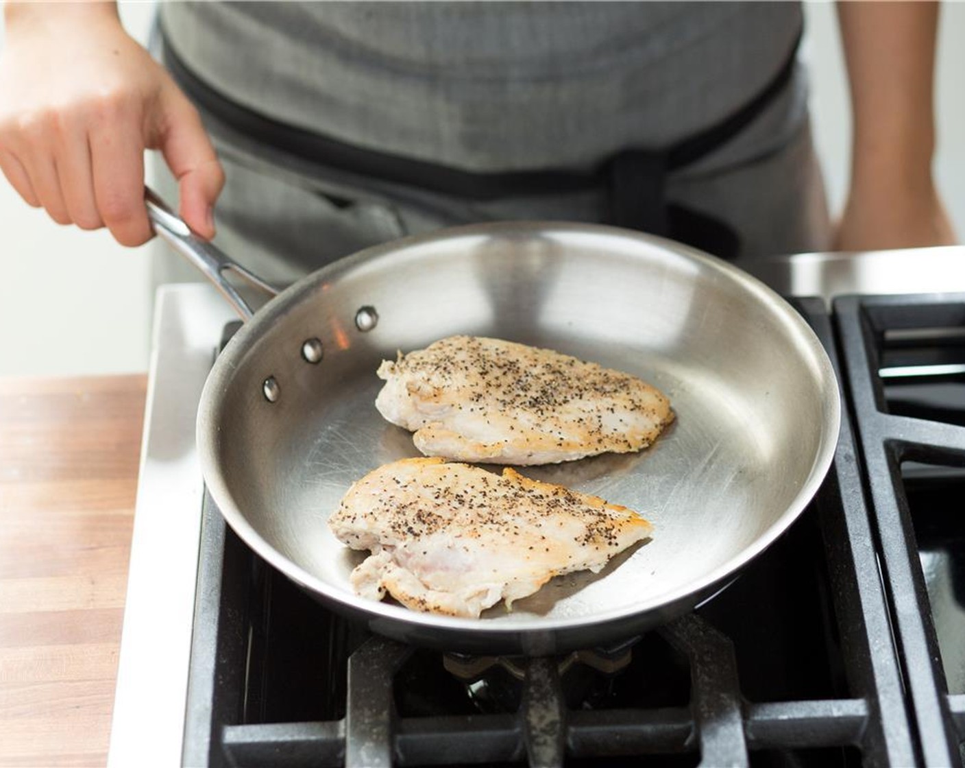 step 10 Pat dry Chicken Breasts (2) with paper towels and season with Salt (1/4 tsp) and Ground Black Pepper (1/4 tsp).