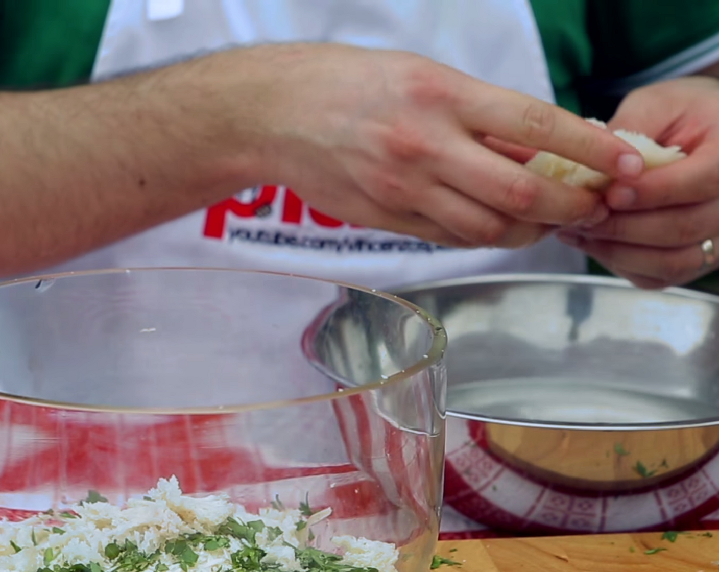 step 5 Next, dip 2 slices of Bread (2 slices) into the bowl filled with Water (as needed), then quickly remove them, squeezing all the water out using your hands.