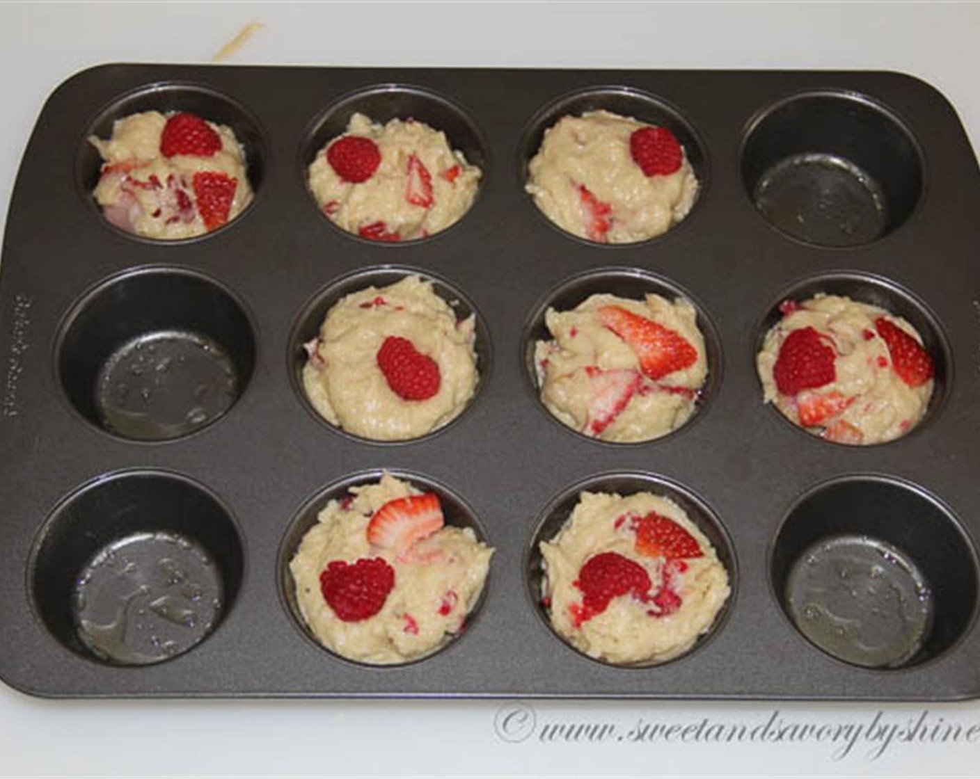 step 5 Spoon the batter into 8  greased muffin cups filling to the top. Bake for about 15-18 minutes, or until an inserted toothpick comes out clean. Cool on wire rack for 5 minutes, and then remove the muffins from the pan to cool completely.