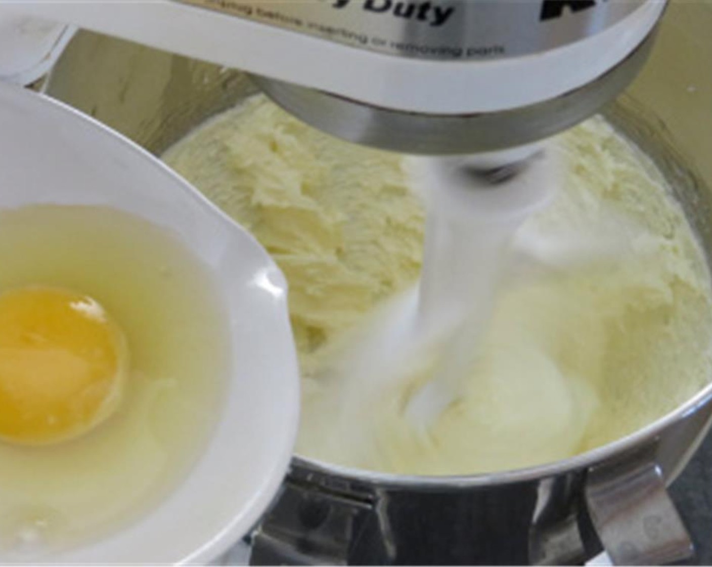 step 5 In a large bowl, cream unsalted butter and Granulated Sugar (1 3/4 cups) until light and fluffy, about 3 minutes. Add large Eggland's Best Classic Eggs (3), one at a time, incorporating each before adding the next. Stir in Vanilla Extract (2 tsp).