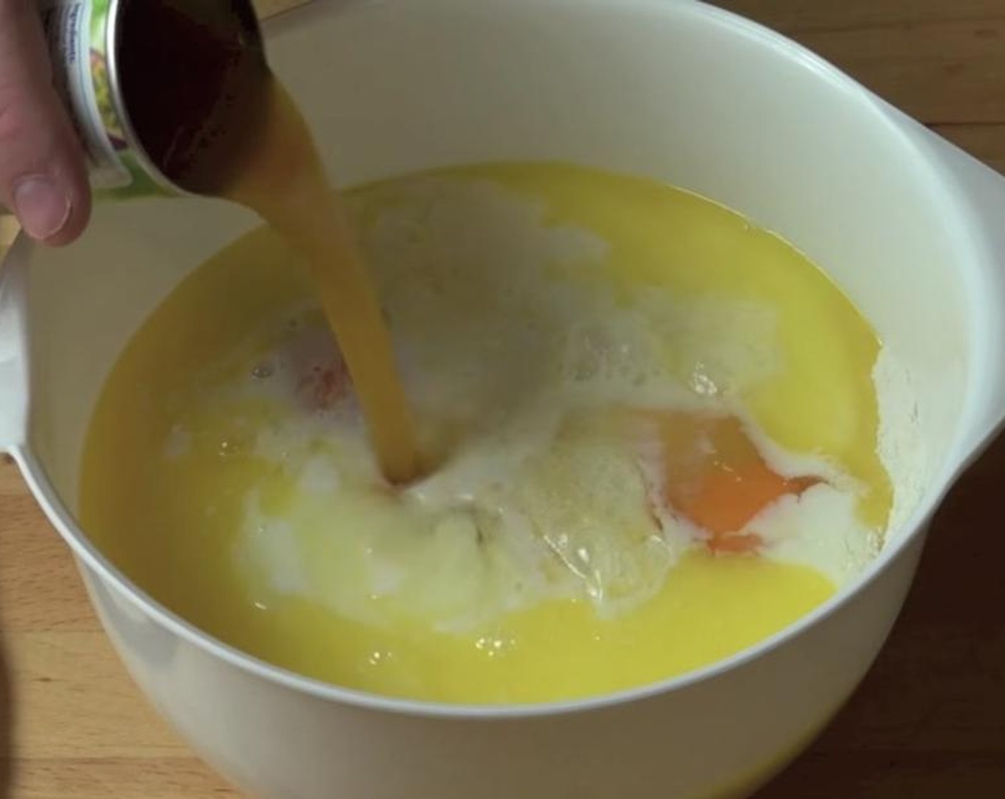 step 3 Add Eggland's Best Classic Eggs (4), Milk (1 1/2 cups), Butter (2.5 oz), Vanilla Extract (2 tsp) and Passion Fruit Pulp (2/3 cup).