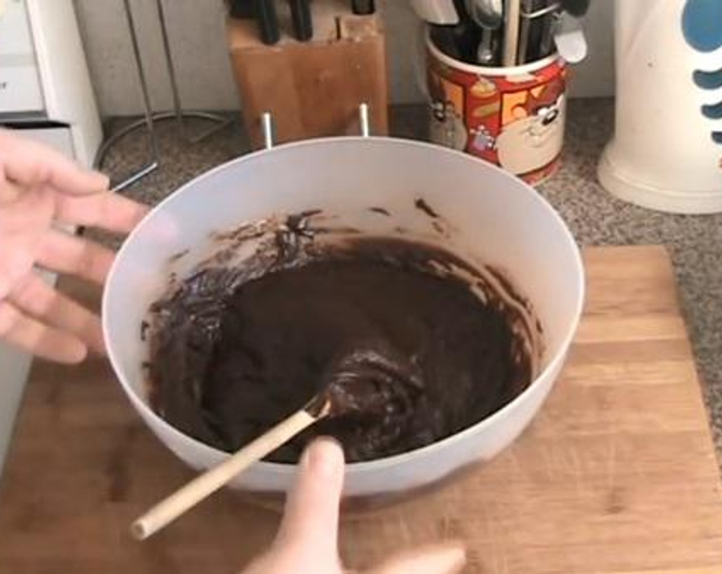 step 3 Pour the chocolate into the flour mixture together with the Eggland's Best Classic Eggs (4). Gently blend everything together.