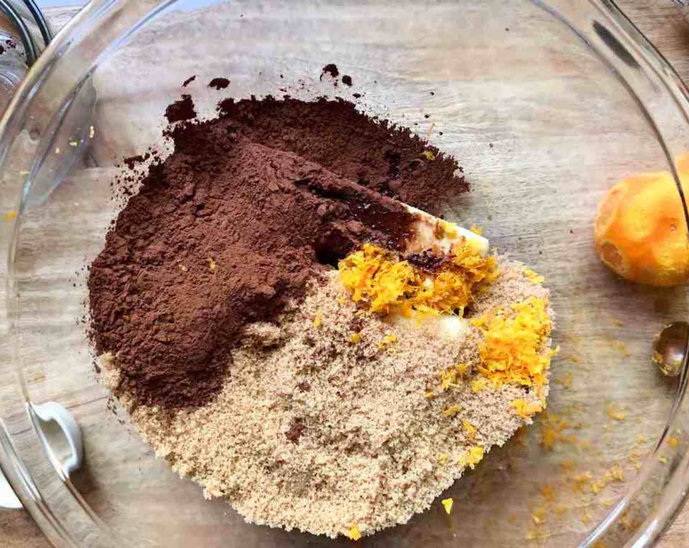 step 3 In the bowl of a stand mixer fitted with the paddle attachment (or in a large mixing bowl with a hand mixer), beat the Unsalted Butter (1 cup), Brown Sugar (2 cups), Unsweetened Cocoa Powder (2/3 cup), 2 tsp of Orange (1), and Pure Vanilla Extract (1 tsp) on medium speed until well combined, for about 4 minutes.