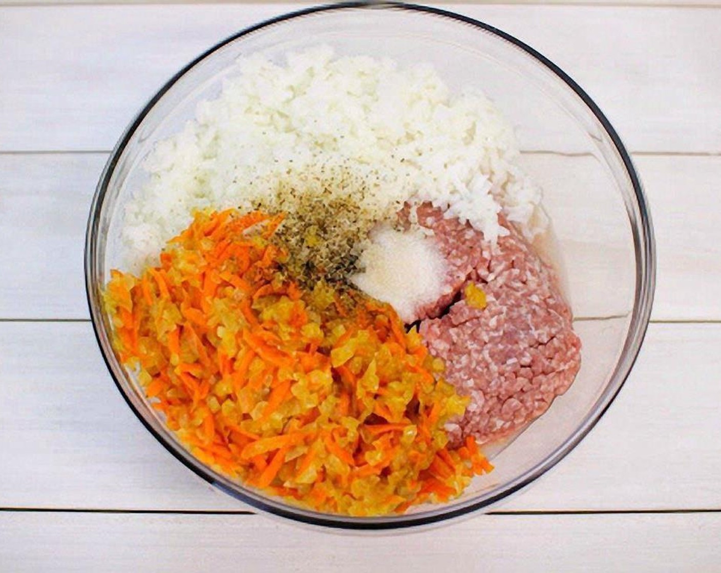 step 4 Combine Ground Pork (1 lb), cooked rice, carrot, onions. and season with Salt (to taste) and Ground Black Pepper (to taste).