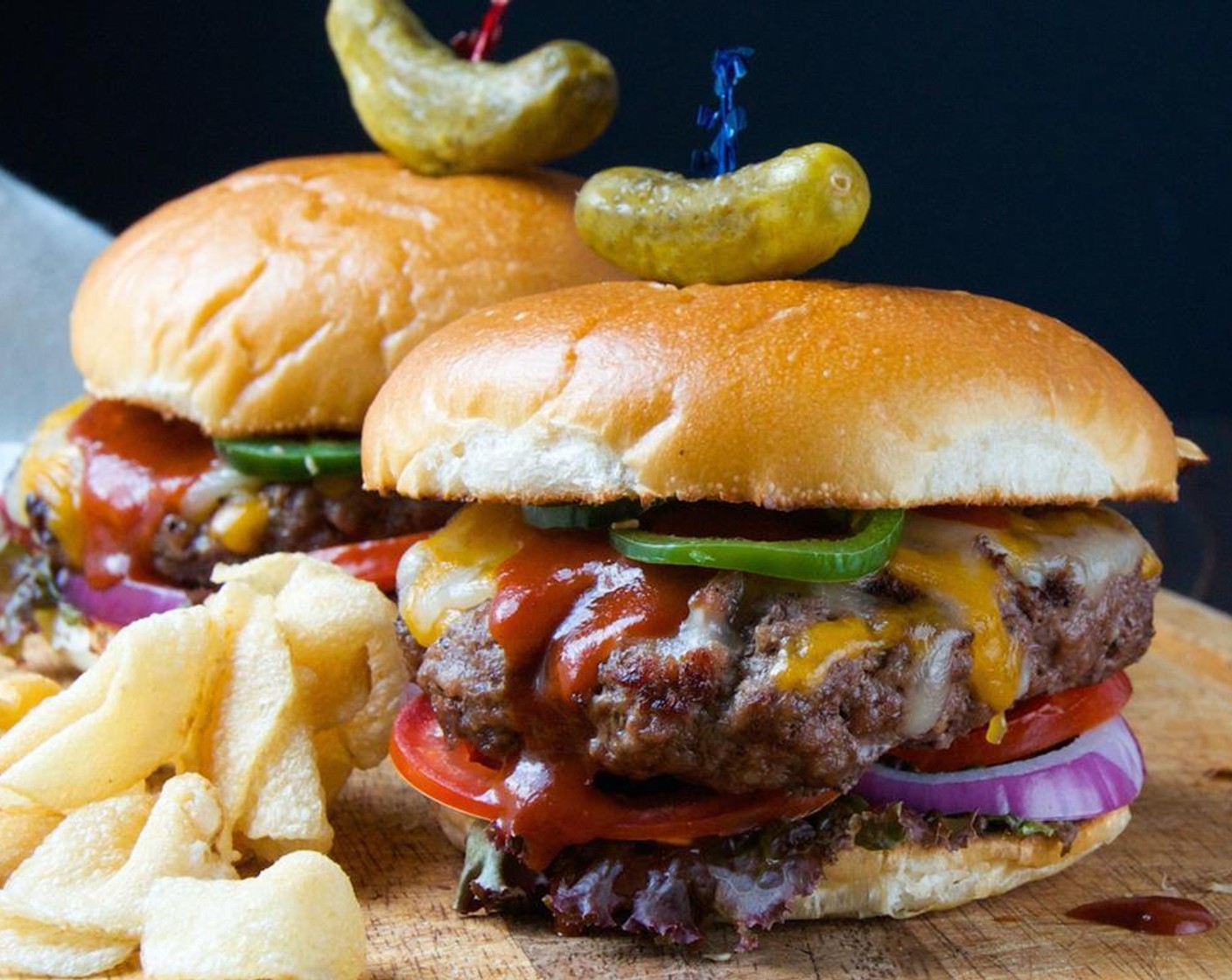 step 11 Dress your burgers using Lettuce (to taste), Tomato (1), Red Onion (1/2), Jalapeño Pepper (1), and Barbecue Sauce (1/3 cup). Serve with Small Dill Pickles (to taste).