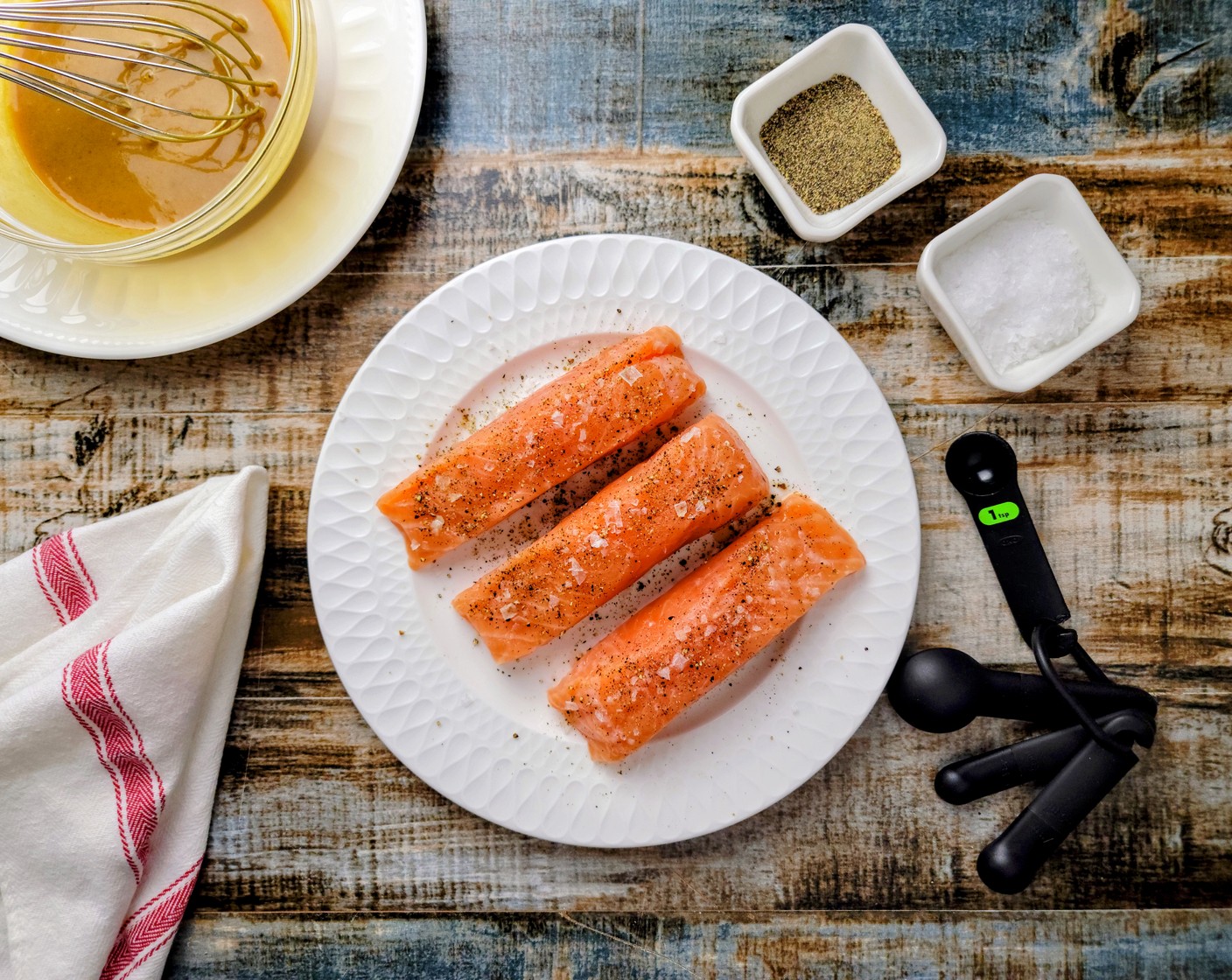 step 3 Sprinkle the Atlantic Salmon Fillet (1 lb) all over with Kosher Salt (1 Tbsp) and Ground Black Pepper (1 Tbsp).