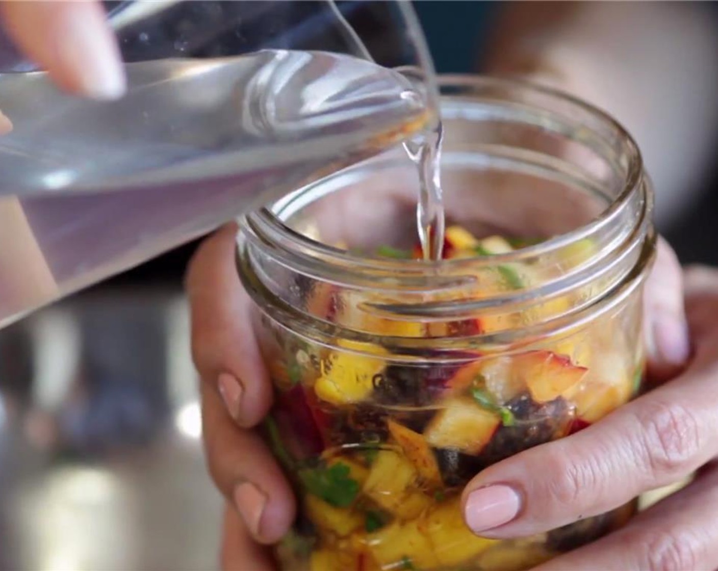 step 7 Add mixture to a wide mouthed mason jar. Pack it in a little to maximize the space and draw out the liquid.  Cover chutney with the salt brine until it reaches about one inch (2.5 cm) above the shoulder of the mason jar.