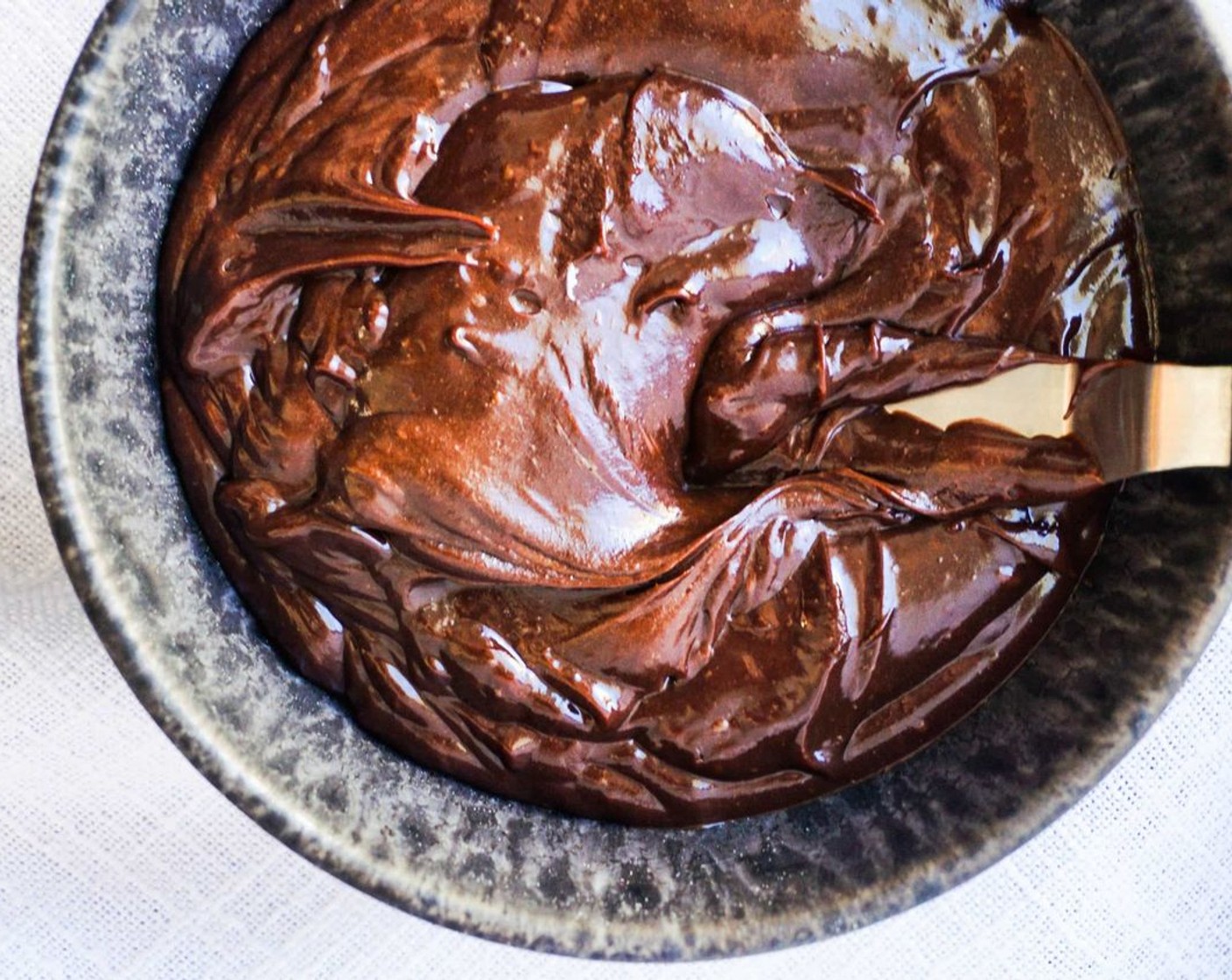 step 11 Scrape down the sides of the bowl and beat with a hand mixer until soft peaks form, about 20 seconds. Any longer the frosting may curdle, so be careful!