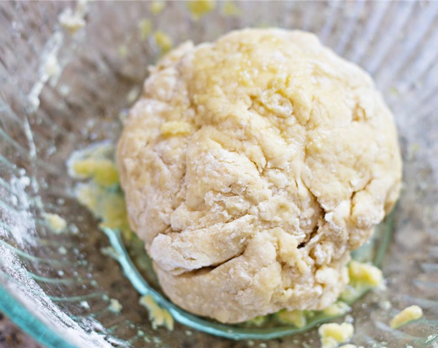 step 3 Keep mixing until you develop a stiff dough that is quite dry. The dryness makes it easier to roll out and keeps the noodles from sticking together when you cook them.