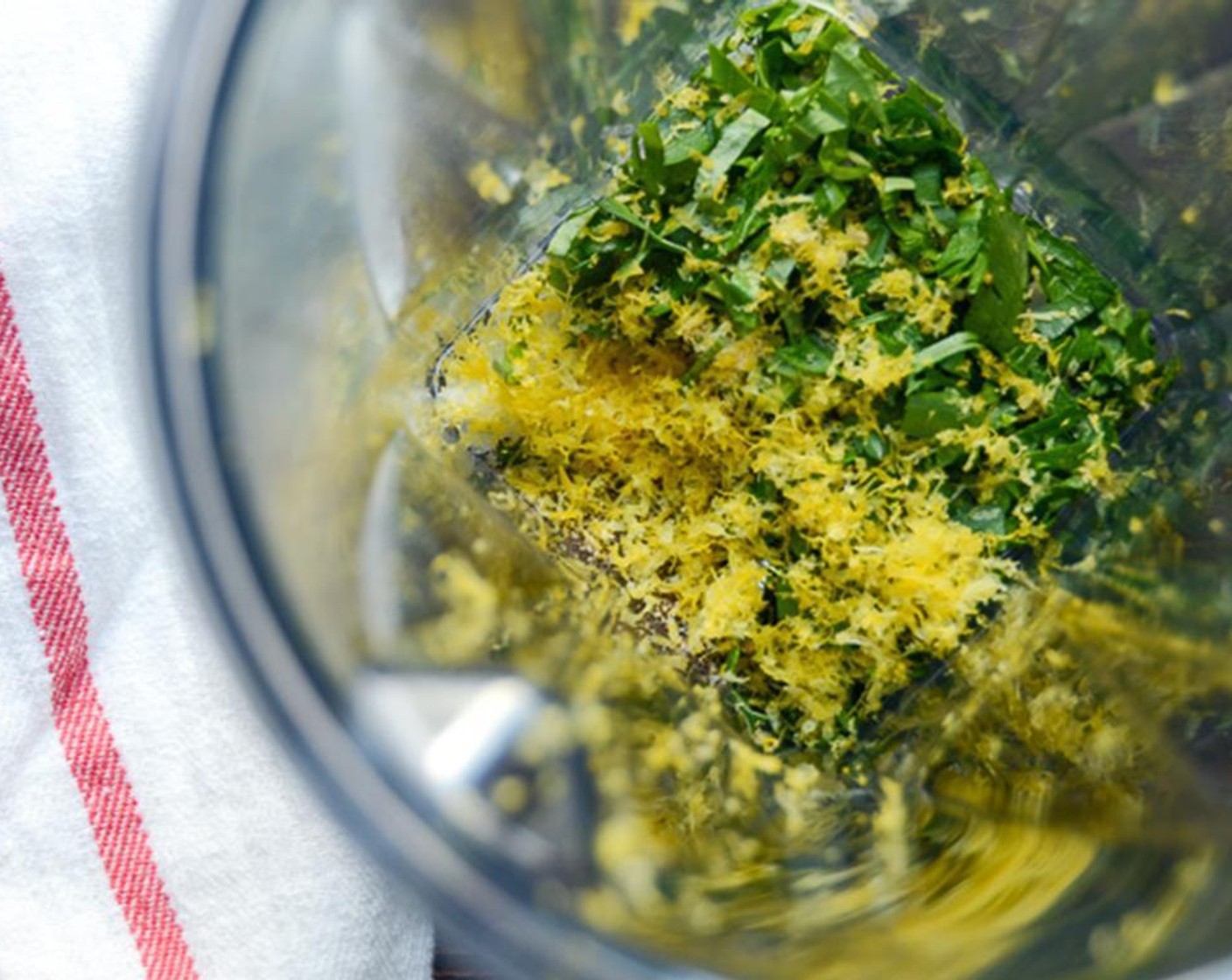 step 3 Add the parsley, basil, garlic and onion to a heavy duty blender. Add the Dry Mustard (1/2 tsp), Salt (1/4 tsp), Ground Black Pepper (1/4 tsp), Mayonnaise (115 g), and the zest of the Lemon (1).