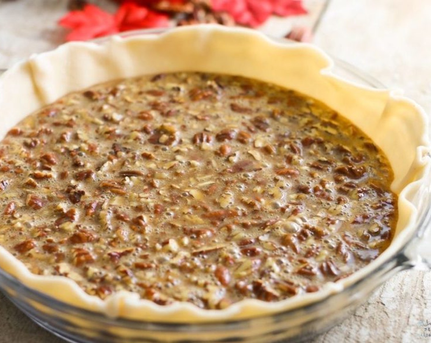 step 5 Fold in Roasted Pecans (1 1/3 cups). Pour pecan filling into the cold pie crust. Arrange Pecan Halves (1 cup) on top of the pie in a decorative pattern.