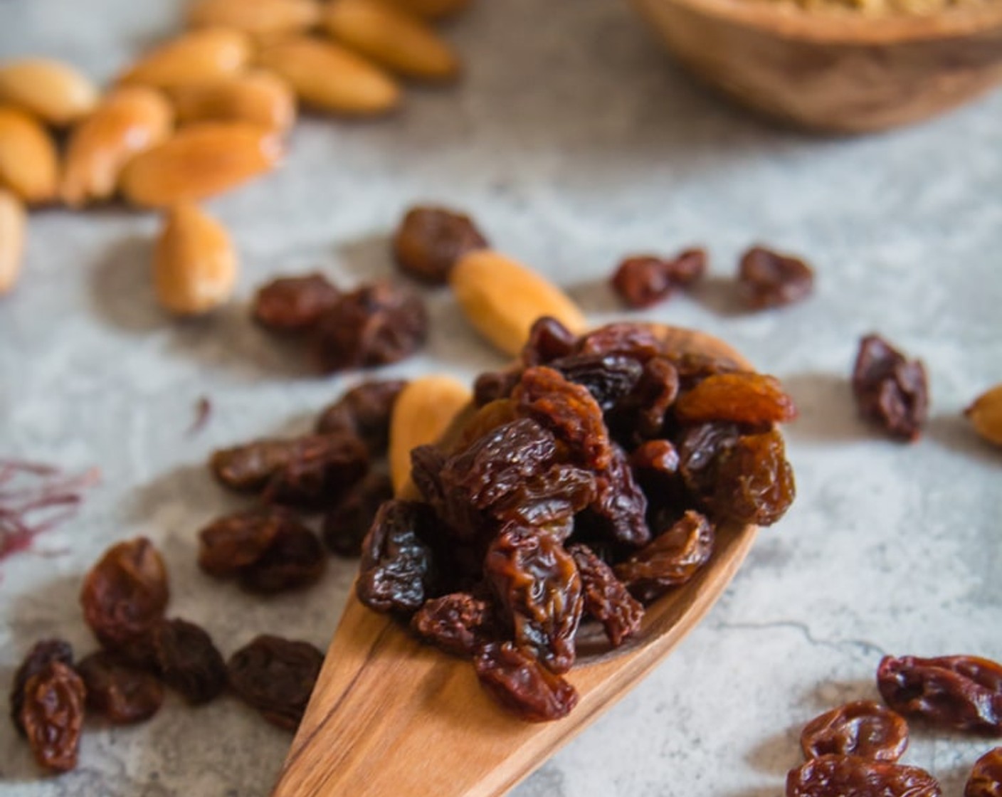 step 8 Prepare the raisins. Soak Sun-Maid Raisins (2/3 cup) in hot water for 20 minutes and drain.