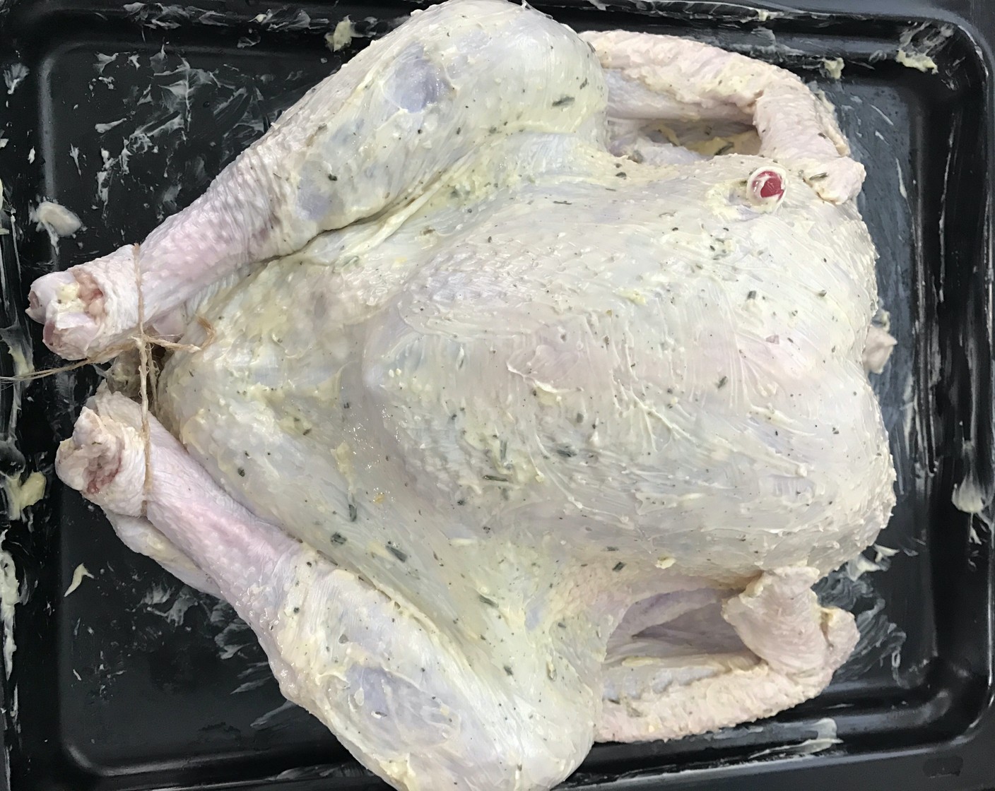 step 7 Place drumsticks inside of the cavity and cover the bird with foil. Continue cooking for 1-2 hours or until the internal temperature in the thickest part of the breast reaches 165 degrees F (75 degrees C). Rest for 15 minutes. Use skewers to attach drumsticks alongside the bird. Serve and enjoy!