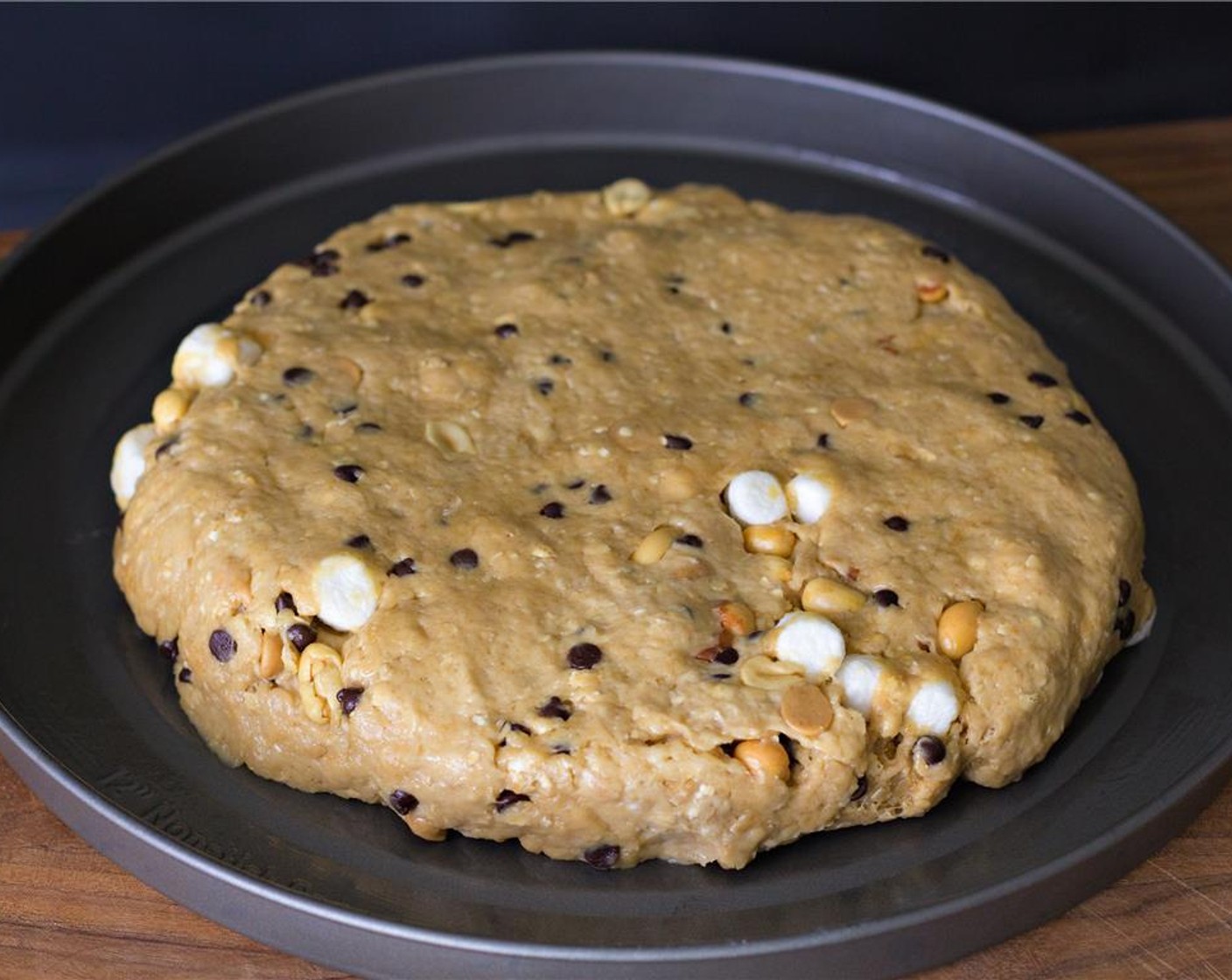 step 8 Line baking sheet with parchment paper. Turn dough onto the baking sheet. Pat dough into an 8-inch round.