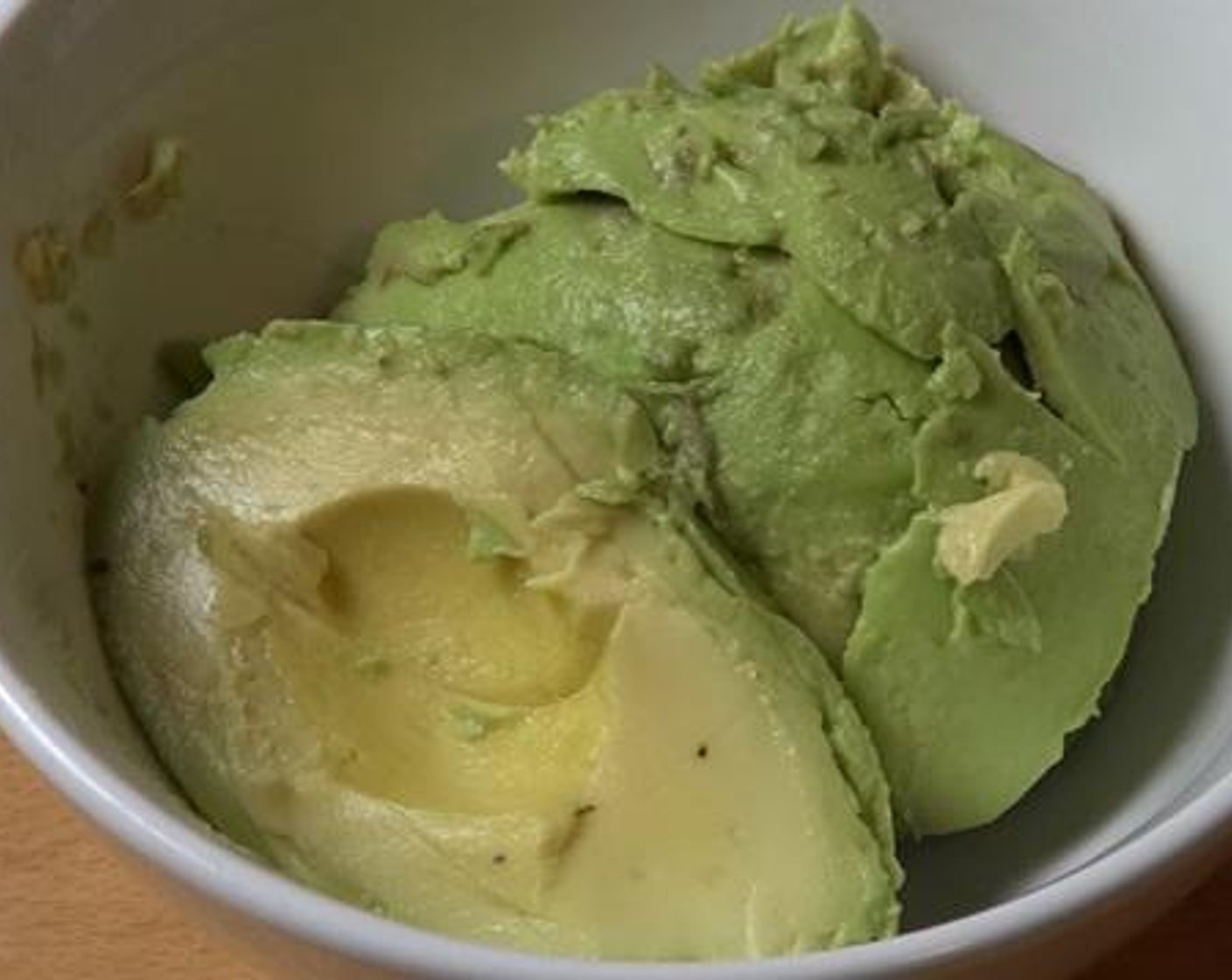 step 1 Scoop out the Avocado (1) into a bowl. Add the juice from Lemon (1) and season with Salt (to taste). Using a fork, mash everything together.