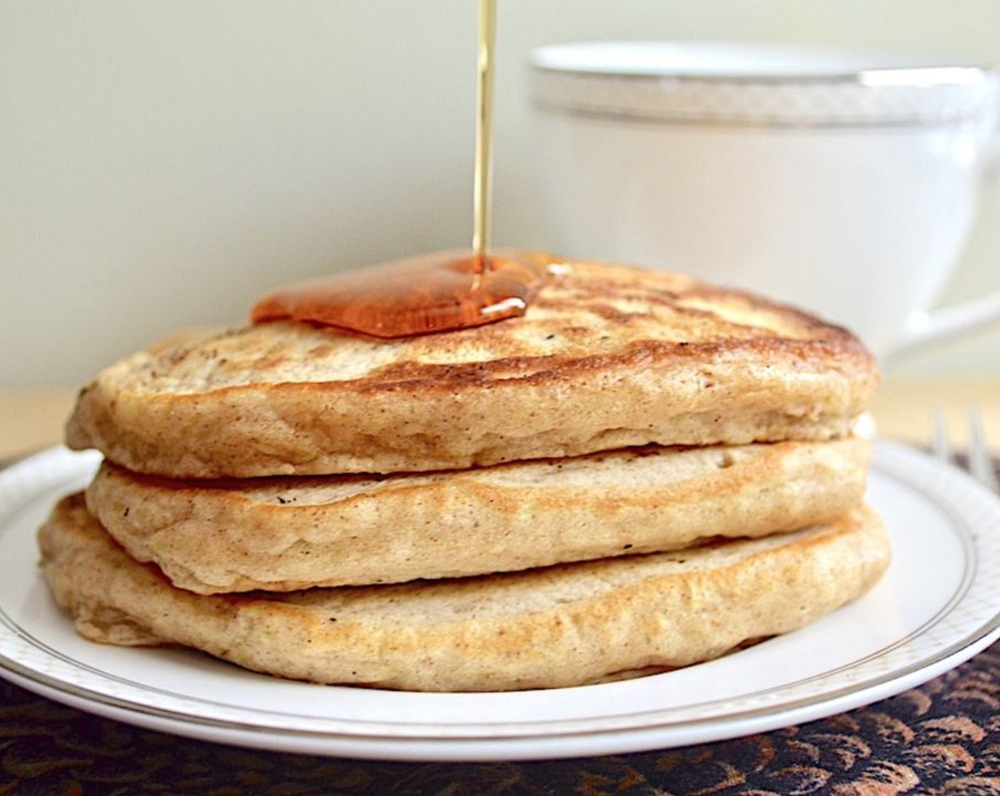 step 5 Plate pancakes as you make them and serve with Maple Syrup (to taste). Enjoy!