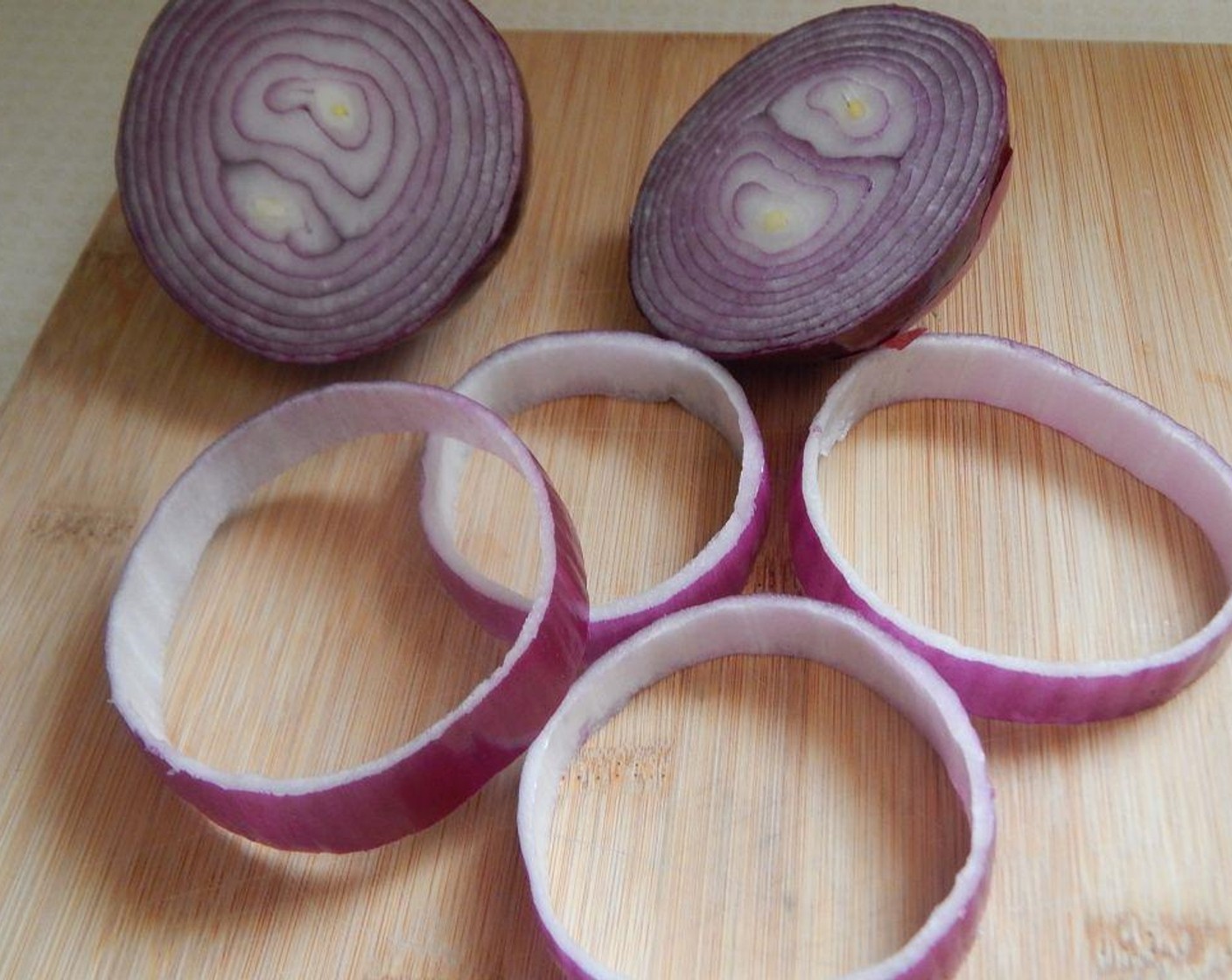step 1 Slice the Onion (1) into rings.