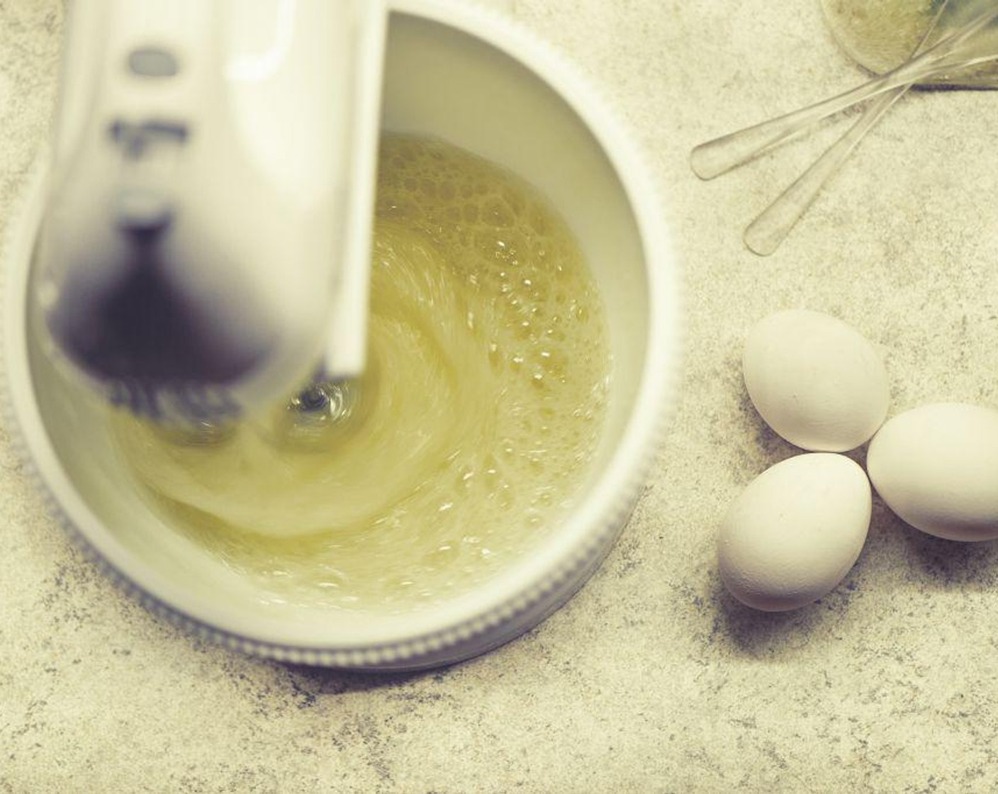 step 2 In a small mixer with a whisk attachment, beat the whites of the Eggs (3) with Cream of Tartar (1/4 tsp).