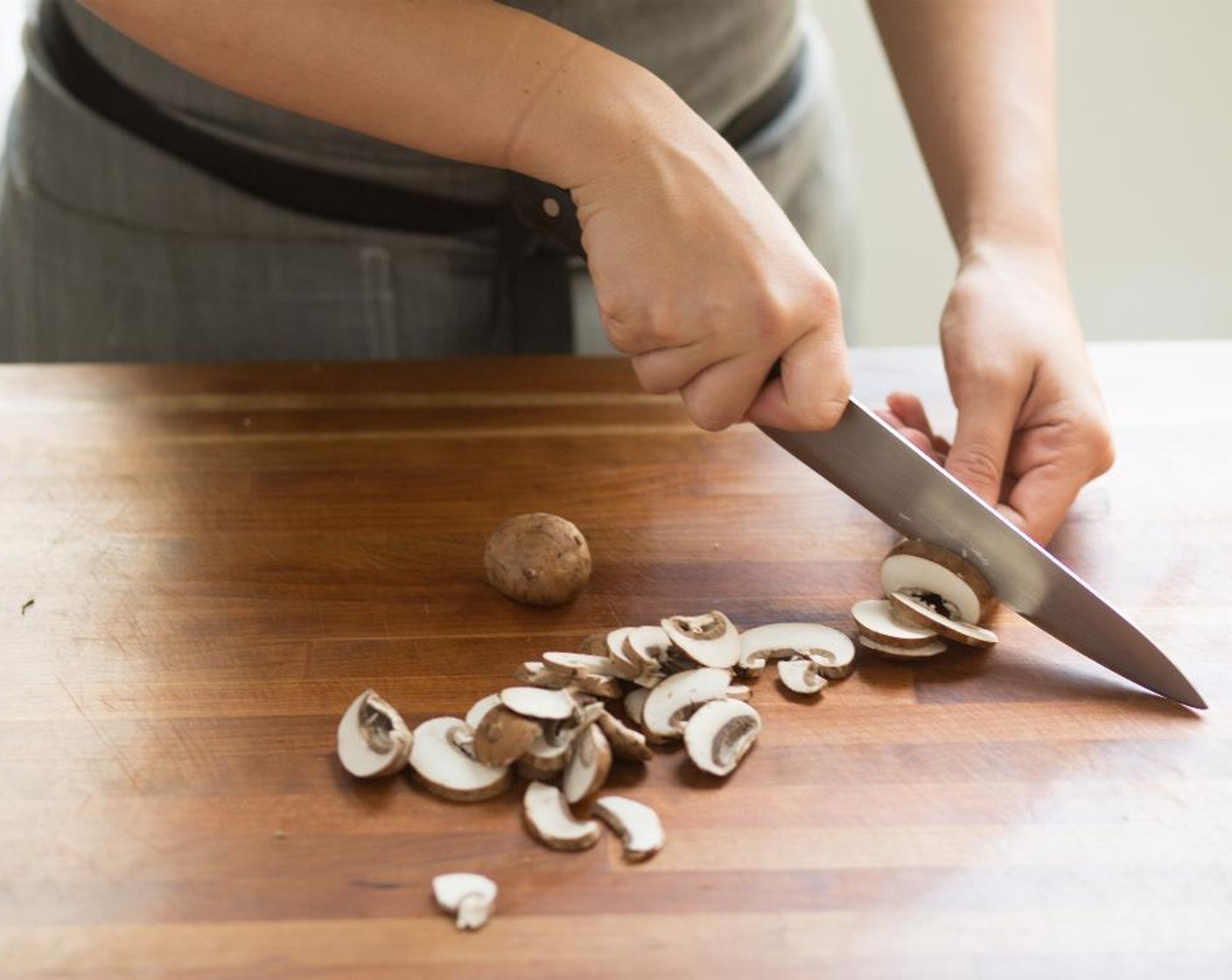 step 2 Remove the stems from the Cremini Mushroom (1 cup) and discard. Cut the mushroom caps into1/4 inch sliced pieces.