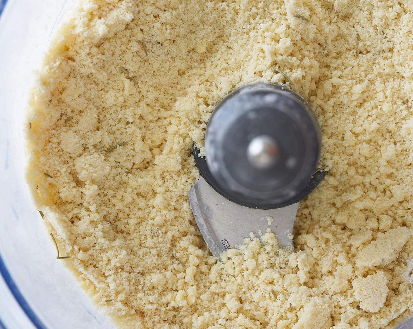 step 2 The easiest way to make the dough for the crust is to use a food processor using the “S” blade. Add to the food processor, the Almond Flour (1 1/2 cups), Tapioca Starch (1/2 cup), Dried Rosemary (1 Tbsp), Salt (1/2 tsp), and Butter (1/3 cup). Pulse until it’s the texture of coarse meal.