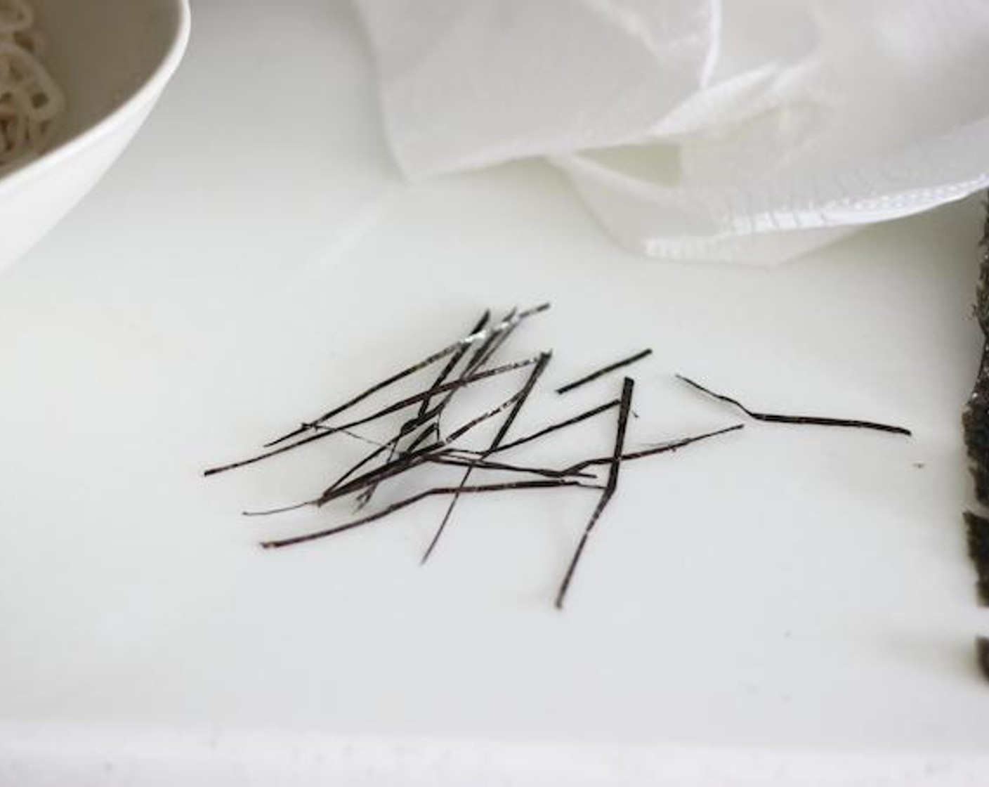 step 3 Use the cooking scissors to cut the Dried Seaweed (1 sheet) as thin as possible! This is great for making Yubaba’s facial wrinkle and eyeliners.