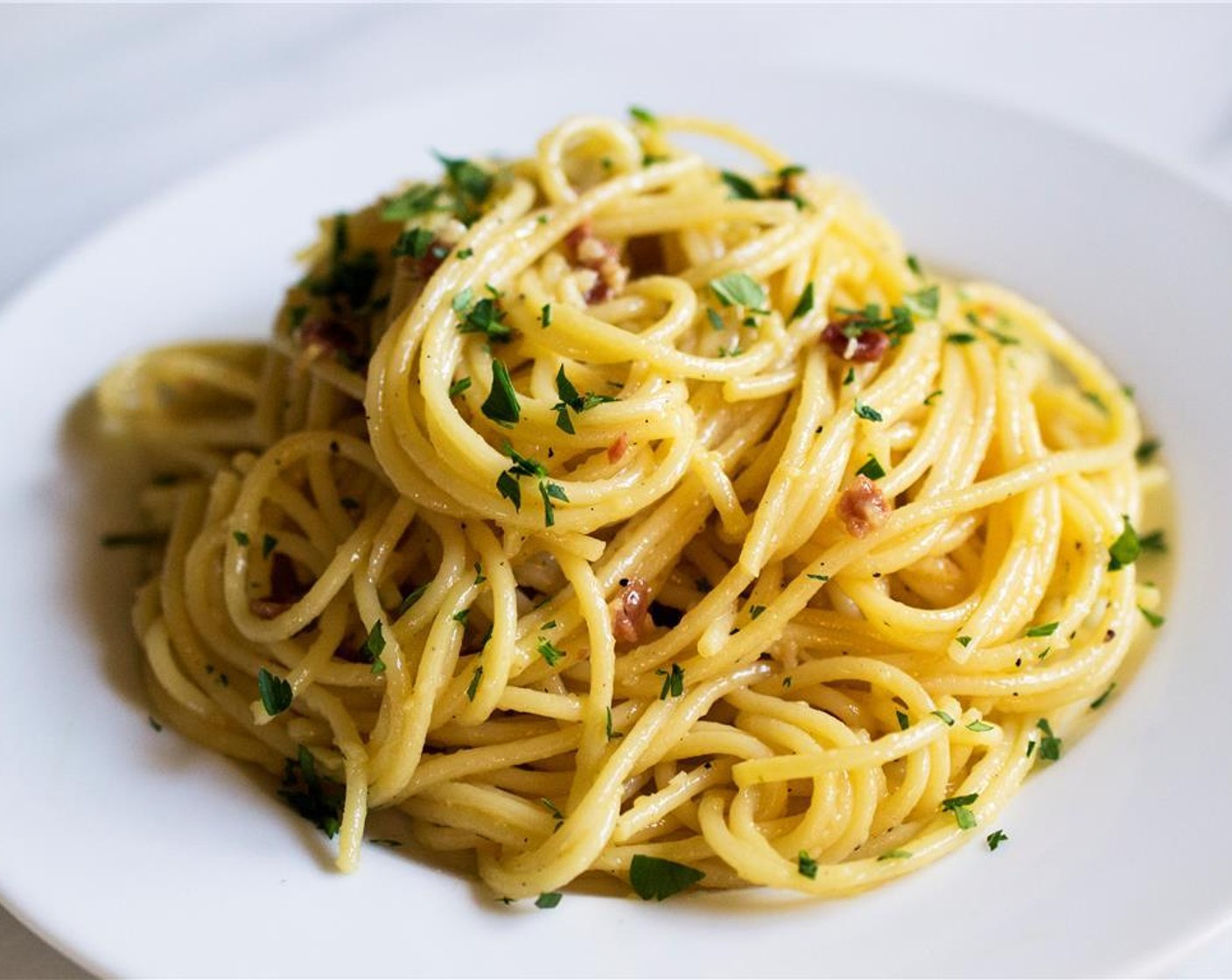 step 8 Garnish the dish with extra Pecorino and Fresh Parsley (1 handful). Serve immediately.