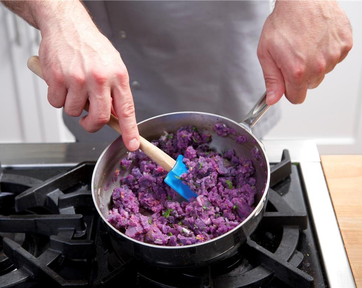 step 9 Use a potato masher to create chunky smashed potato. Add shallot and 3/4 of the parsley to the potatoes. Add 2 tablespoon of oil, lemon juice, zest, 1 teaspoon salt and 1/2 teaspoon pepper. Mix thoroughly and cover until ready to plate.