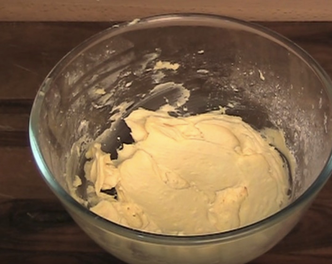 step 8 In a mixing bowl, add Butter (2.5 oz), Vanilla Extract (1 tsp) and Powdered Confectioners Sugar (1 cup). Using an electric mixer, beat together until smooth.