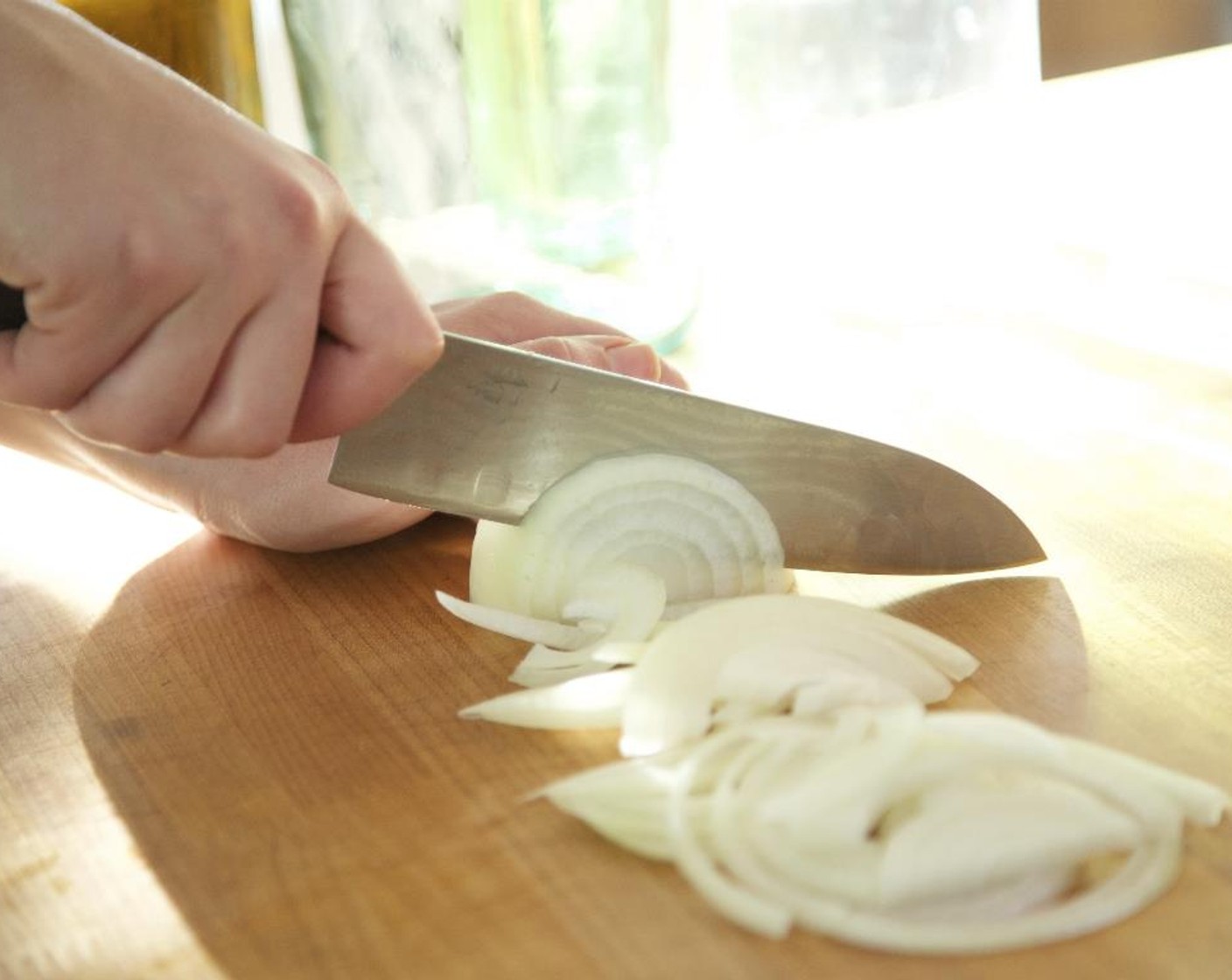 step 10 Peel the Yellow Onion (1). Slice in half, then cut each half into 1/4 inch slices; hold.