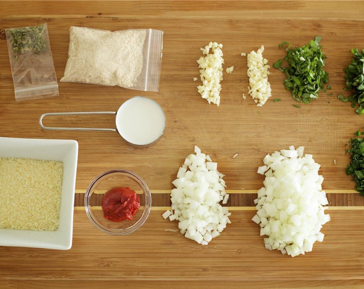 step 2 Finely chop Fresh Basil (2/3 cup), divide in half, and set aside.