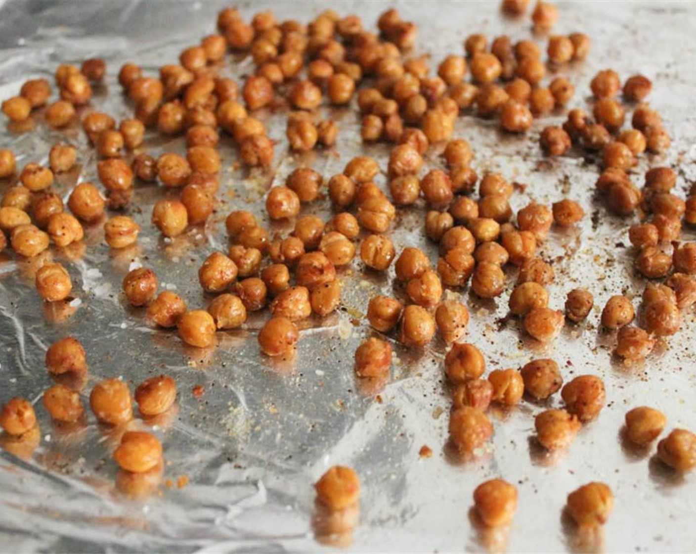 step 4 Transfer the baking sheet to the oven and bake for 30-40 minutes until golden and crispy. Stir after about 15 minutes. The cooking time will vary depending on the size of your chickpeas. Make sure to check on them after 30 minutes.