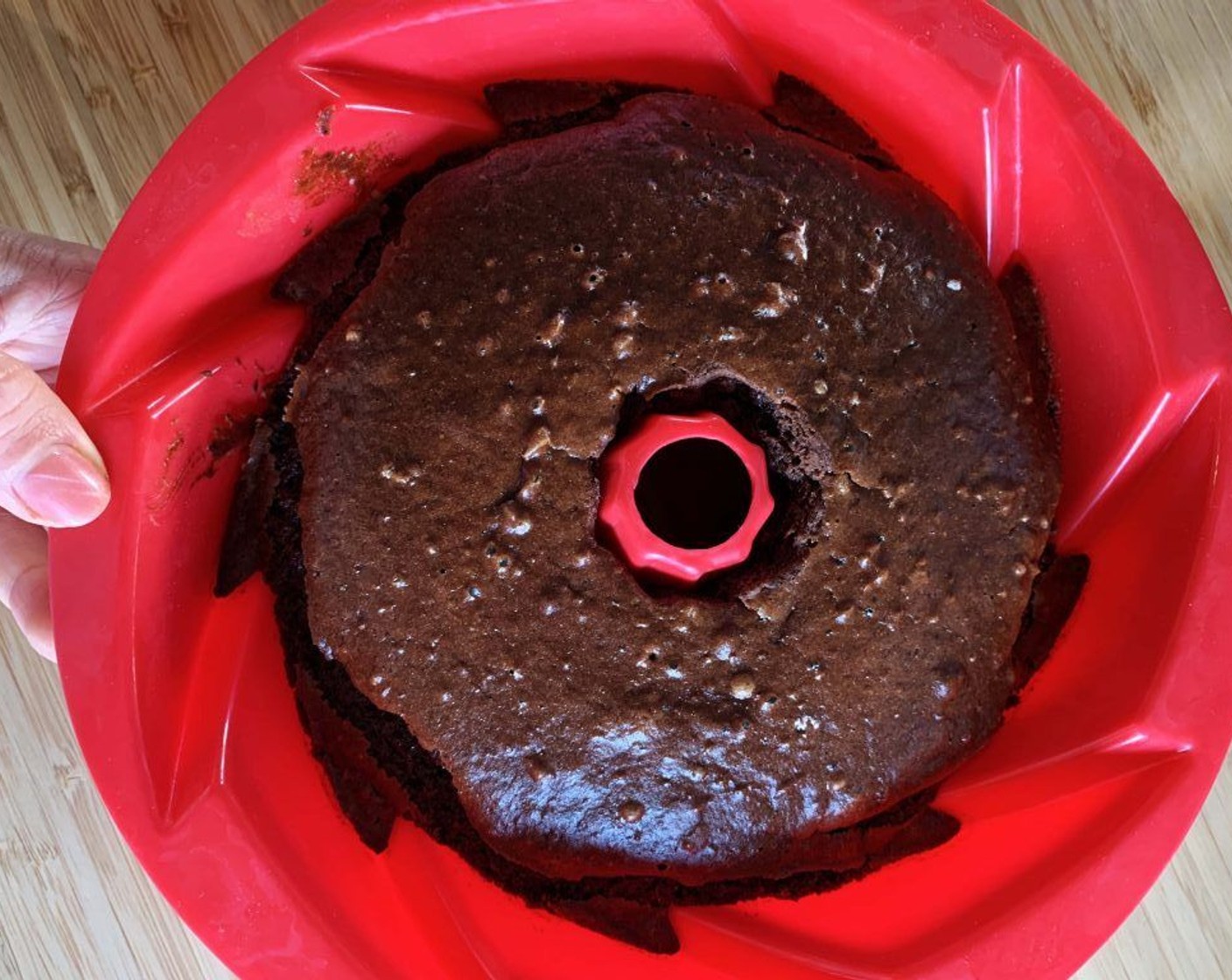 step 7 Bake in preheated oven for about 50 minutes. Take it out of the oven and let the cake cool down completely before removing it from the pan.