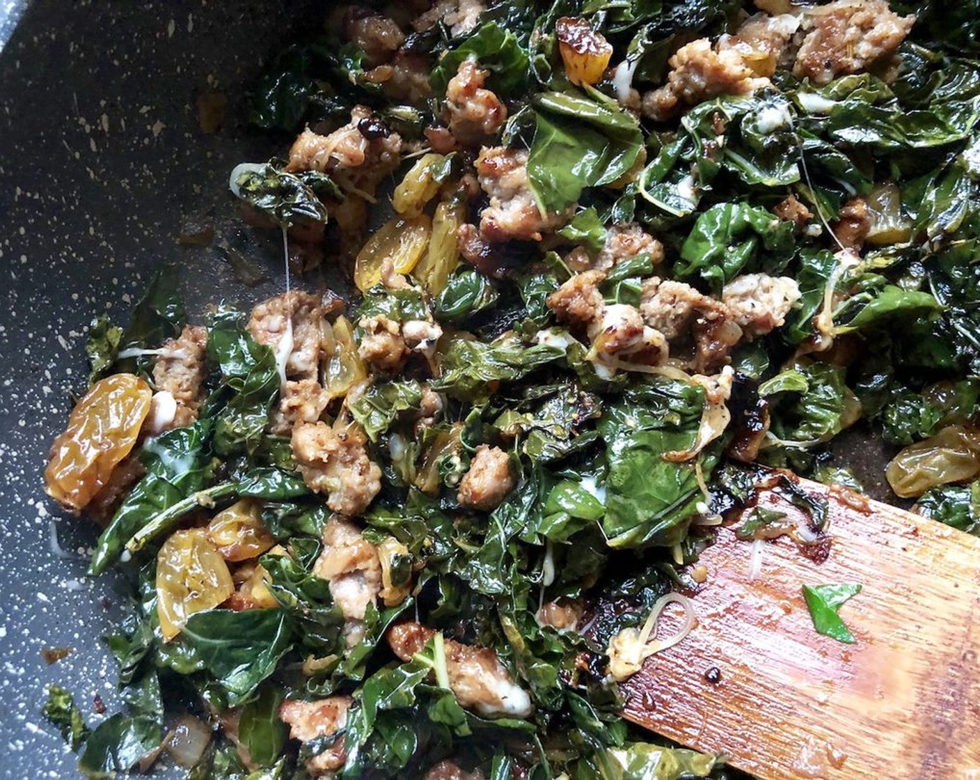 step 4 Add Kale (8 cups), Golden Raisins (1/3 cup) and Chicken Stock (1/3 cup); stir to combine. Cover; cook for 8 to 10 minutes or until kale is tender, stirring occasionally. Remove from heat. Stir in Swiss Cheese (4 Tbsp) and the remaining Freshly Ground Black Pepper (1/4 tsp).