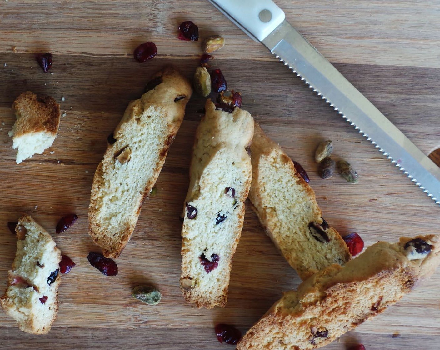 step 8 Take out of the oven and let cool for 15 minutes. Using a serrated knife, cut the biscotti at a sharp angle to make biscotti pieces.