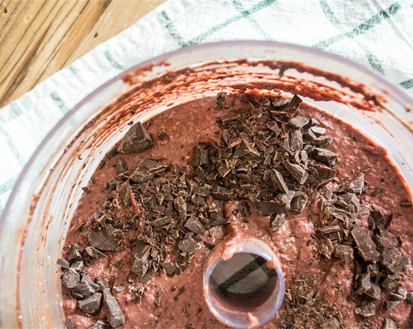 step 4 Add in Beet (1/2 cup) and Canned Black Beans (1 cup). Blend 10 to 20 seconds or until the mixture has formed a thick batter. Stir in Dark Chocolate (1/4 cup).