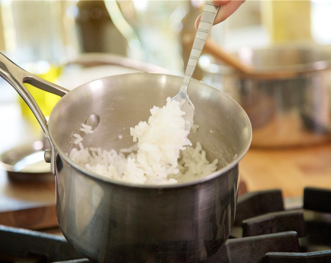 step 2 Remove from heat, fluff rice, and hold for plating.