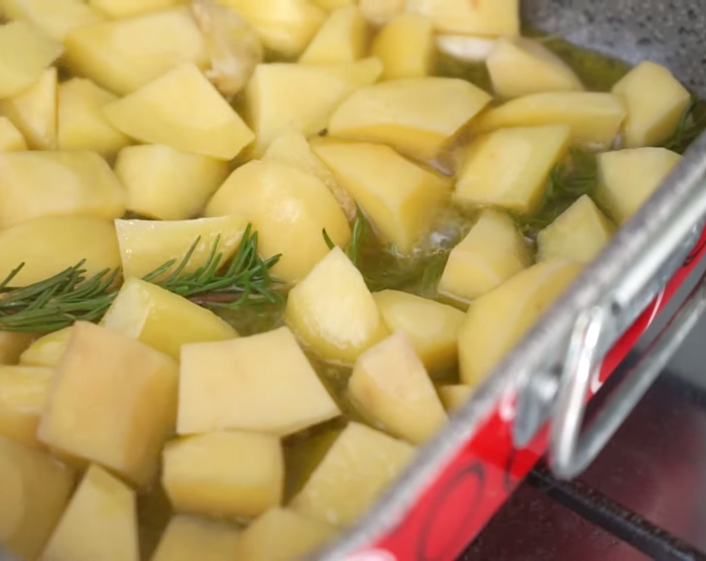 step 5 Braise the roasted potatoes at medium heat on the stovetop, mixing and turning them with a fork every so often, for up to 15 minutes.