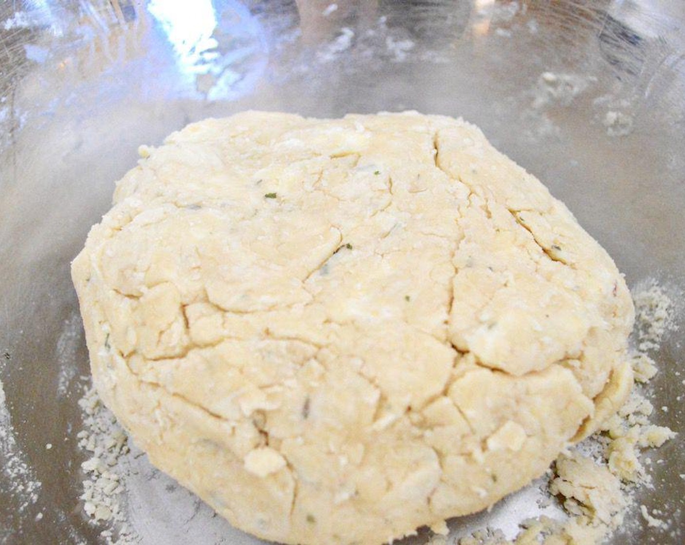 step 2 Bring it together into a ball with your clean hands, then cut it in half. Place each half on their own big piece of plastic wrap and pat them out into discs. Wrap each disc completely in plastic and chill them for 30-45 minutes. While the pie dough chills, work on the filling.