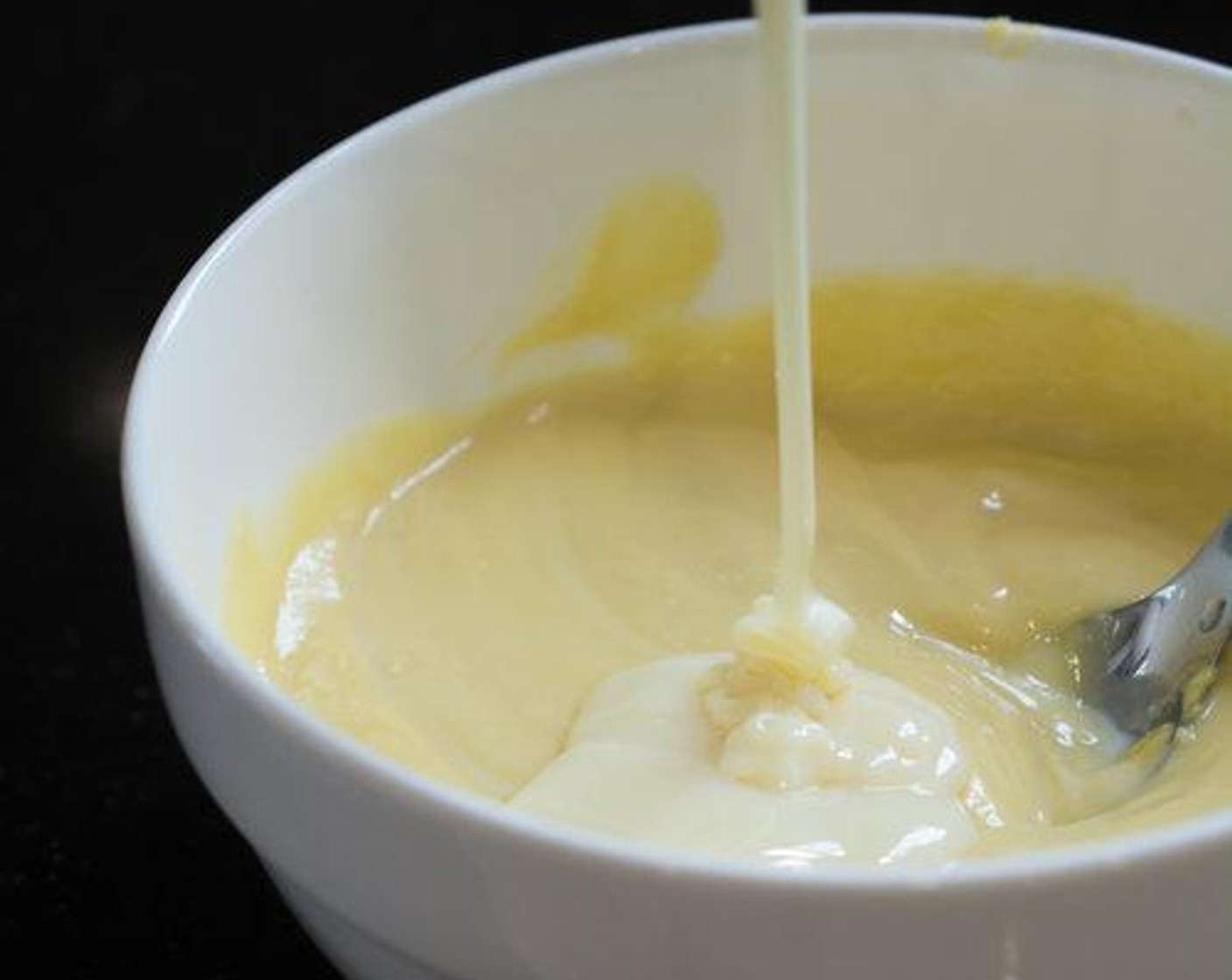 step 2 Stir Sweetened Condensed Milk (3/4 cup) into the strained durian pulp, mix well then set aside.