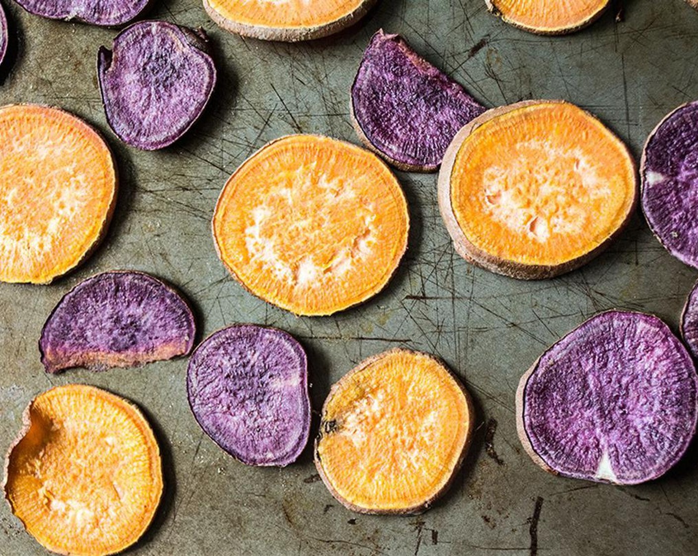 step 2 Line baking sheet with nonstick spray, lay Sweet Potato (1/2) out in single layer. Bake for 15 minutes or until cooked through, flipping halfway through.