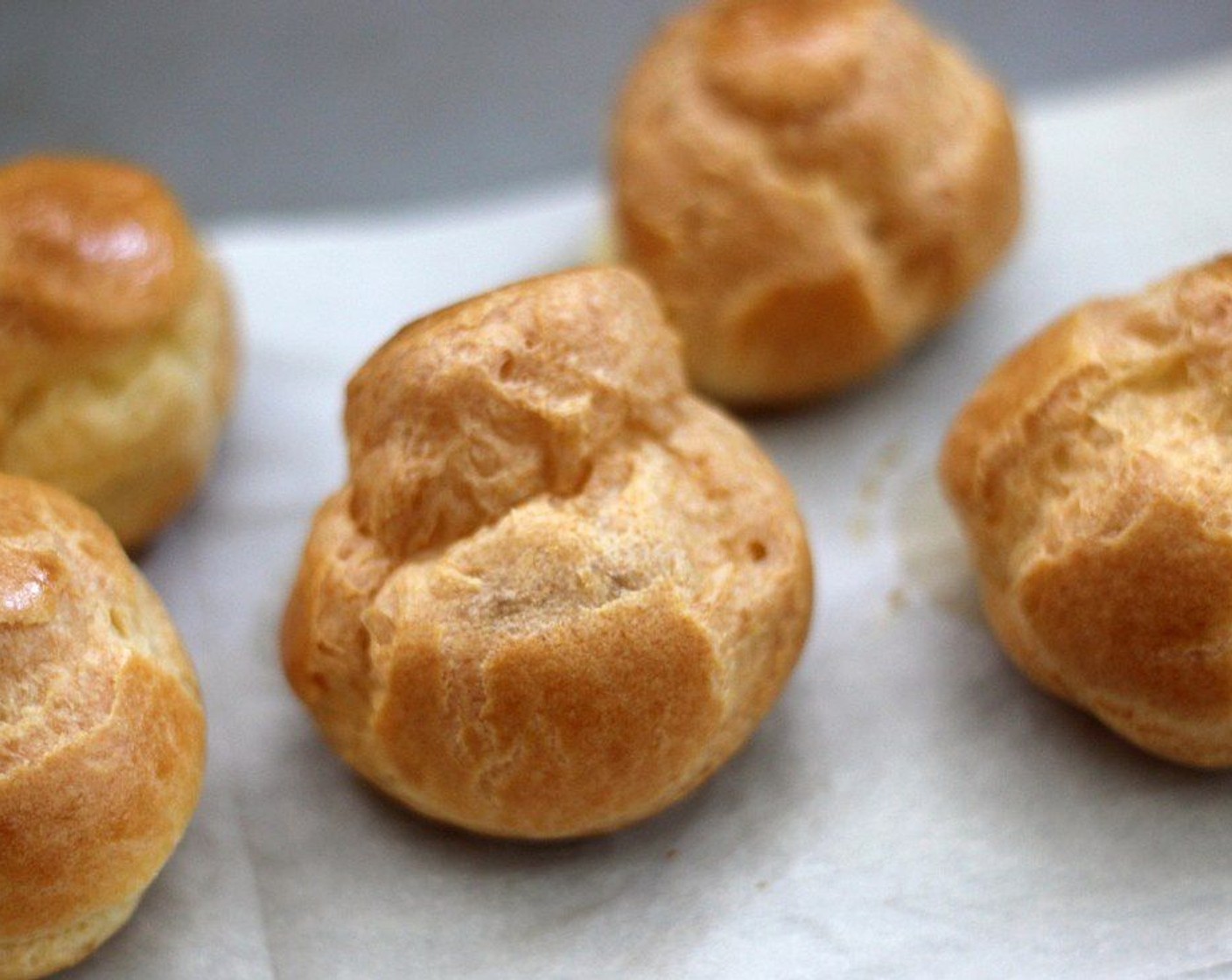 step 9 Turn the heat down to 375 degrees F (190 degrees C) and bake an additional 25 minutes or until the choux pastry is golden brown. Do not open the oven door while they bake, you want the heat to dry out the center of the eclairs.