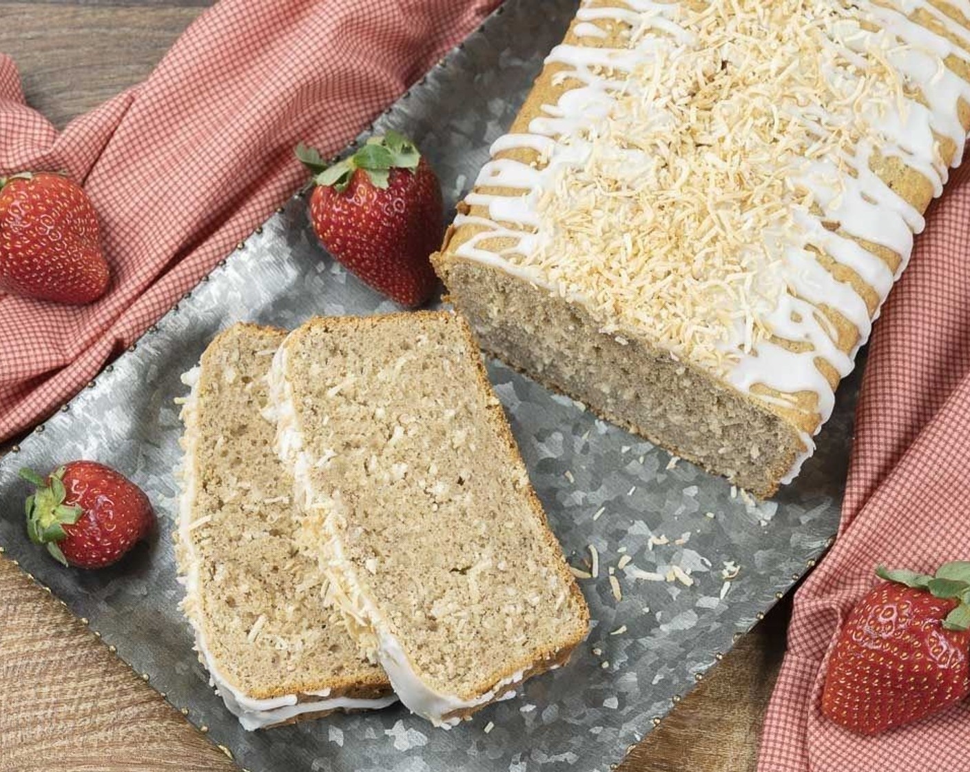 step 10 Drizzle glaze over loaf and garnish with toasted coconut. Slice and serve.