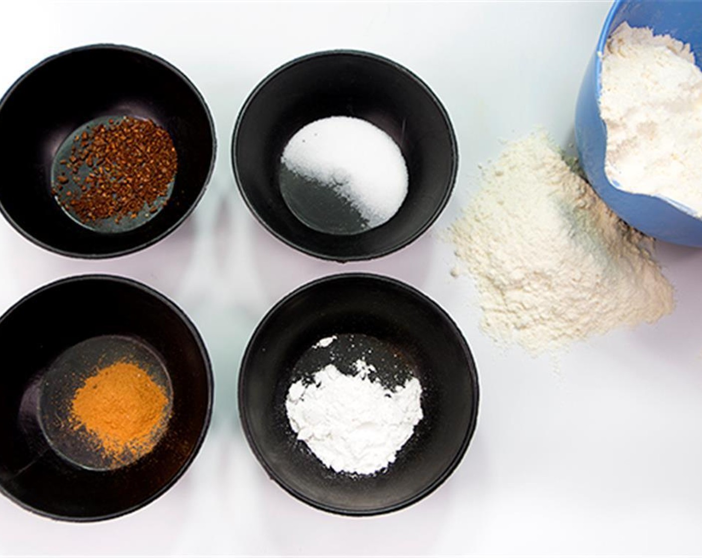 step 4 Mix dry ingredients together: All-Purpose Flour (3 1/3 cups), Baking Powder (1/2 Tbsp), Salt (1/2 Tbsp), Ground Cinnamon (1 tsp), and Ground Cloves (1 tsp).