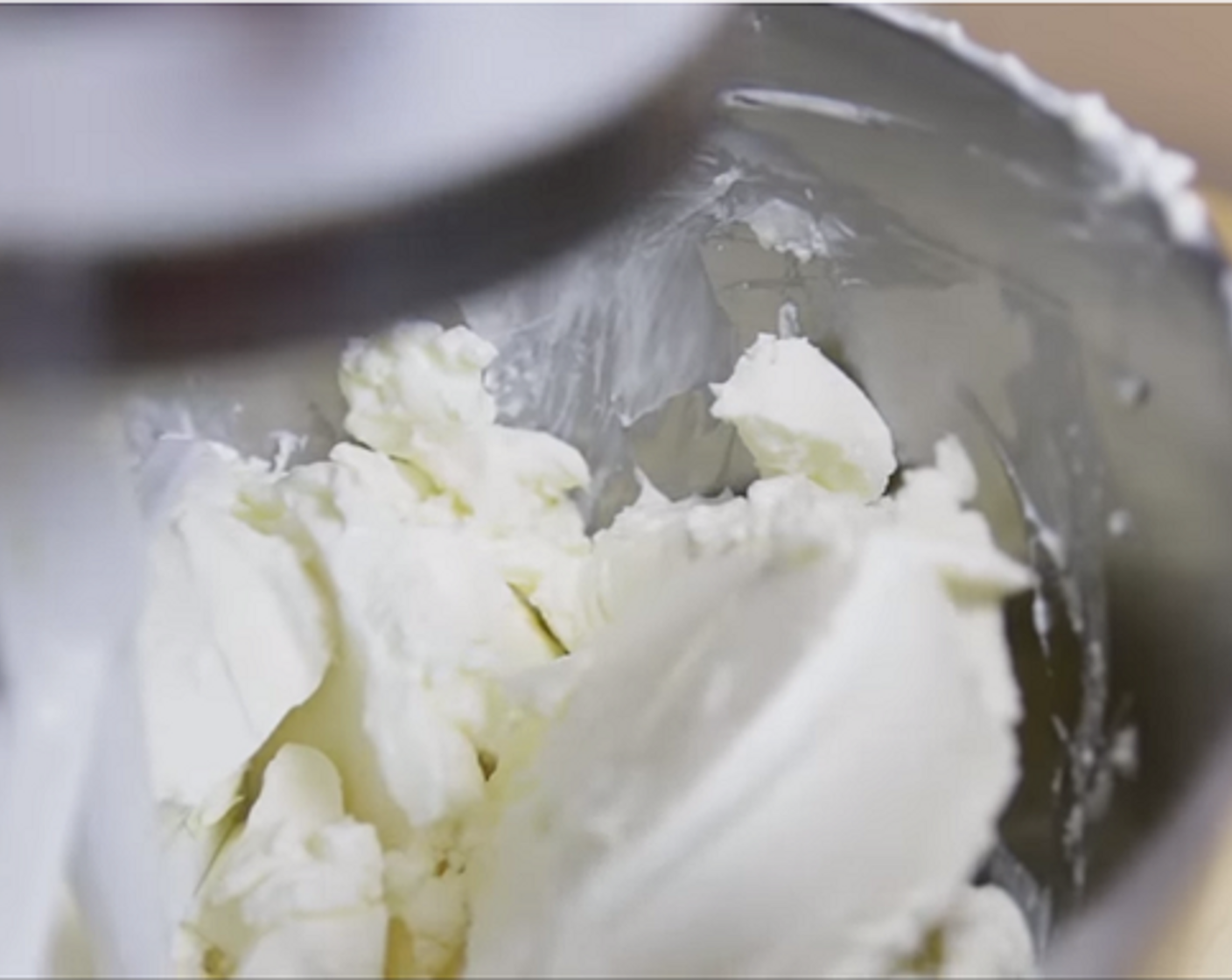 step 3 In the bowl of a stand mixer fitted with a paddle attachment, beat Cream Cheese (4 cups) to loosen it up a bit (3-5 minutes). Scrape bottom and sides of the bowl to pull up any lumps.